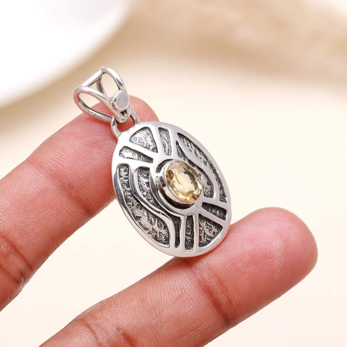 The Golden Eye: Oxidised Oval Shield Silver Pendant