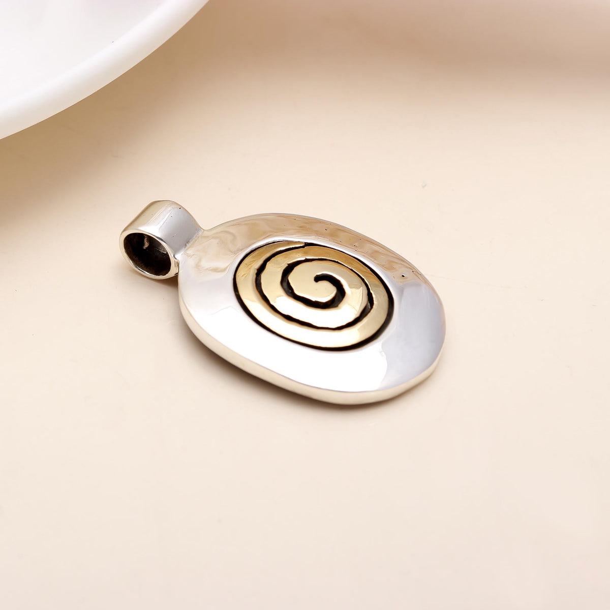 The Golden Spiral: Two-Tone Brass Spiral Oval Silver Pendant