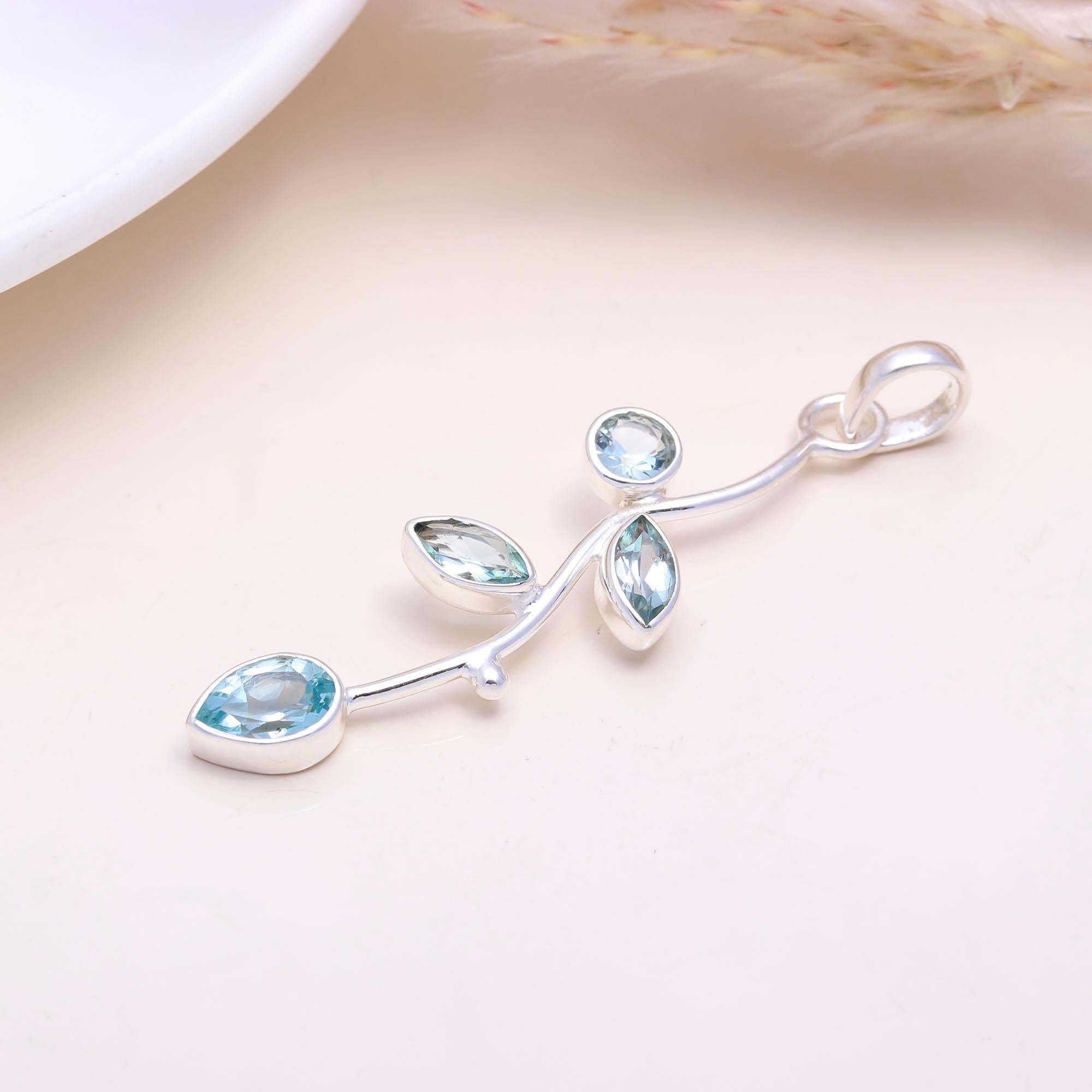 The Nature's Path: Blue Topaz Leaf Branch Pendant