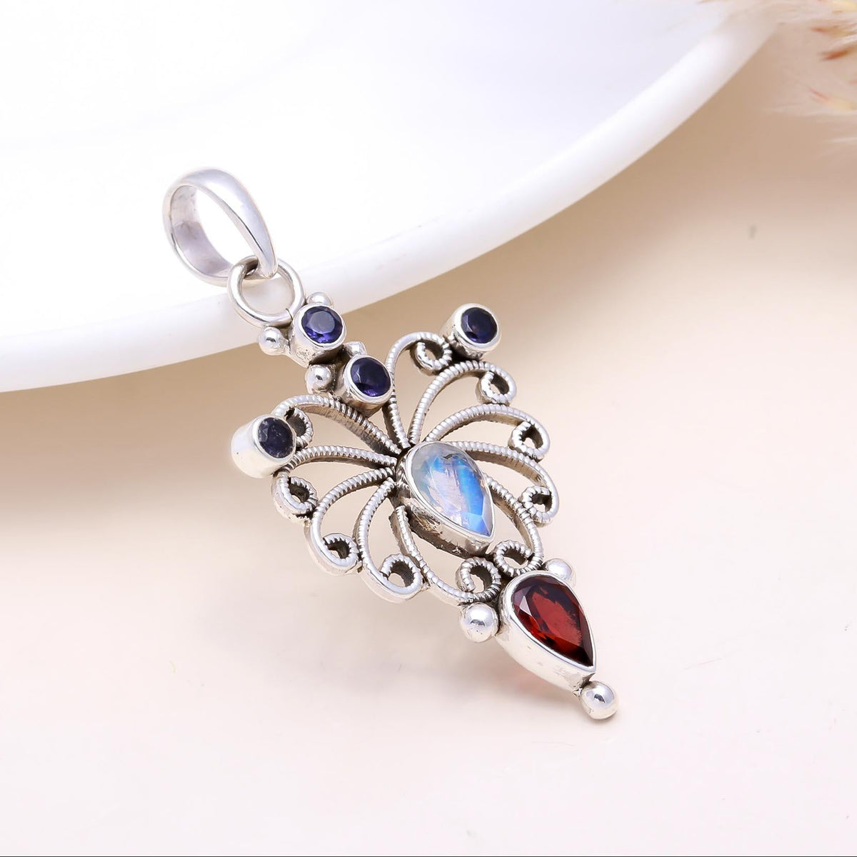 The Celestial Butterfly: Moonstone & Garnet Pendant