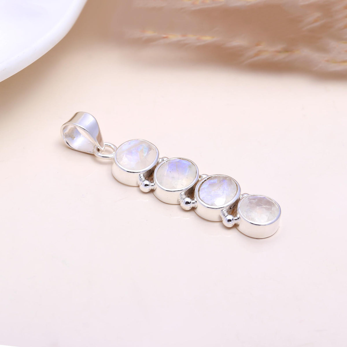 The Moonstone Cascade: Linear Rainbow Moonstone Pendant