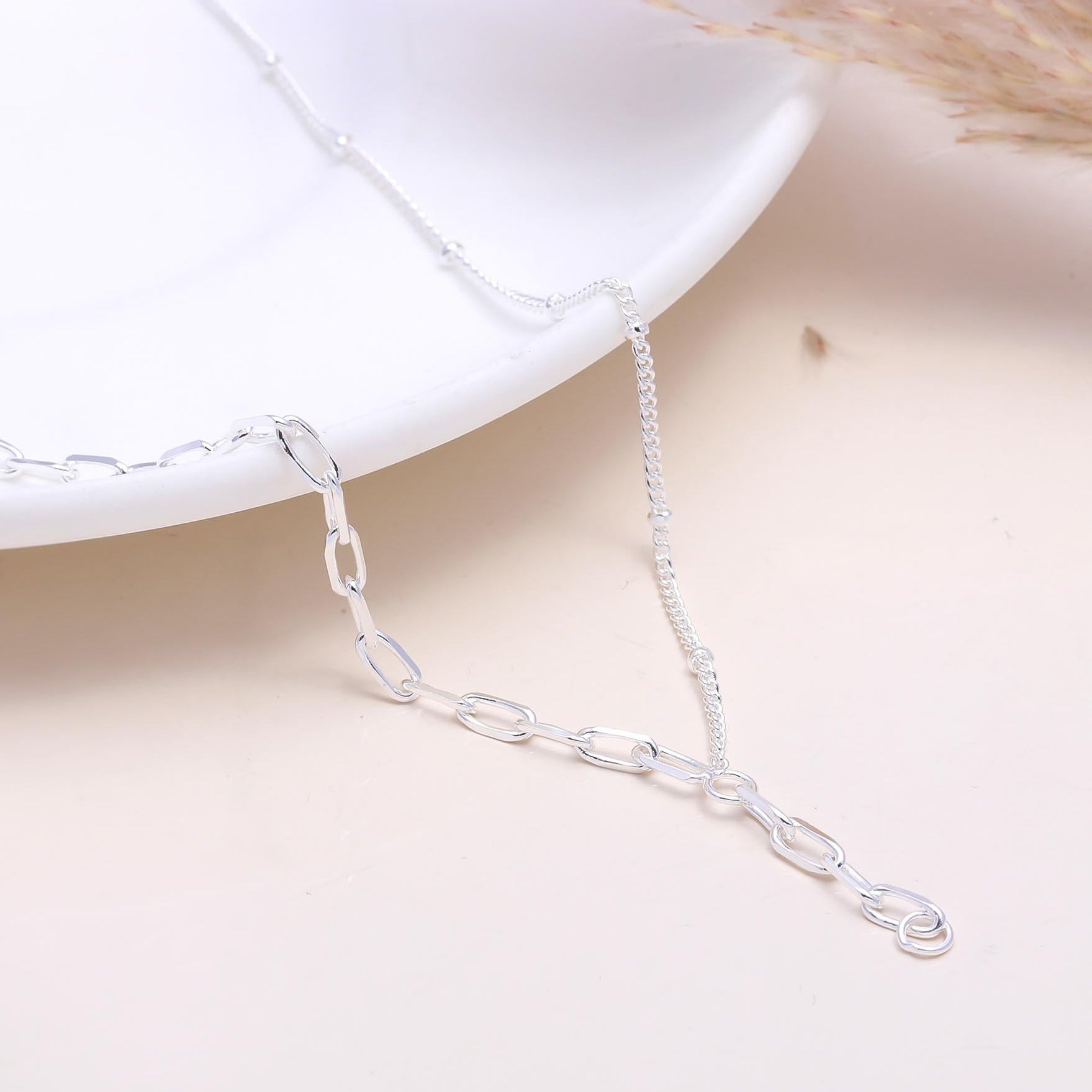 925 Sterling Silver Asymmetric Y Drop Chain Necklace laid out on a white surface, showcasing the Y-shape and beaded design.