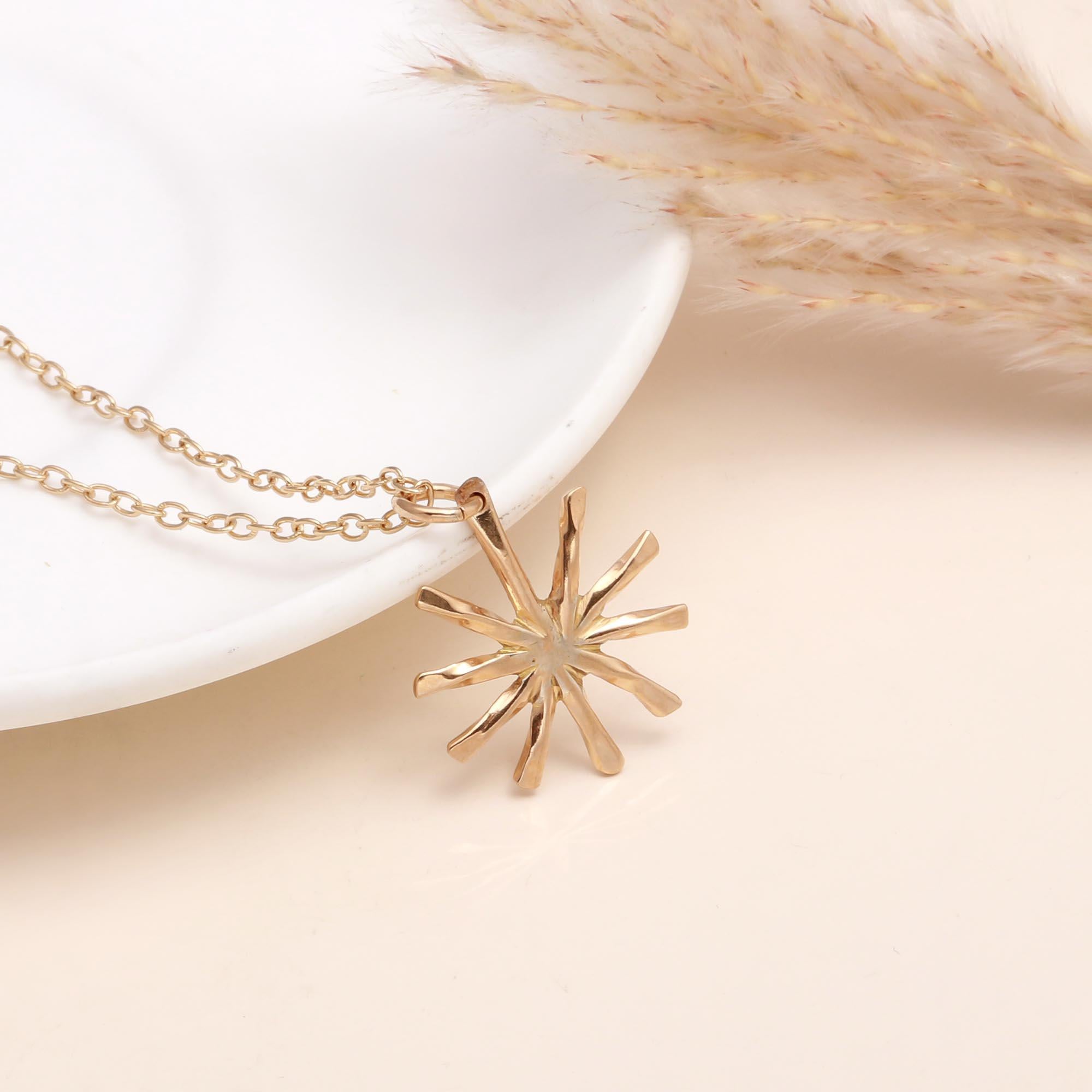 The Golden Spark: 3D Starburst Charm Necklace