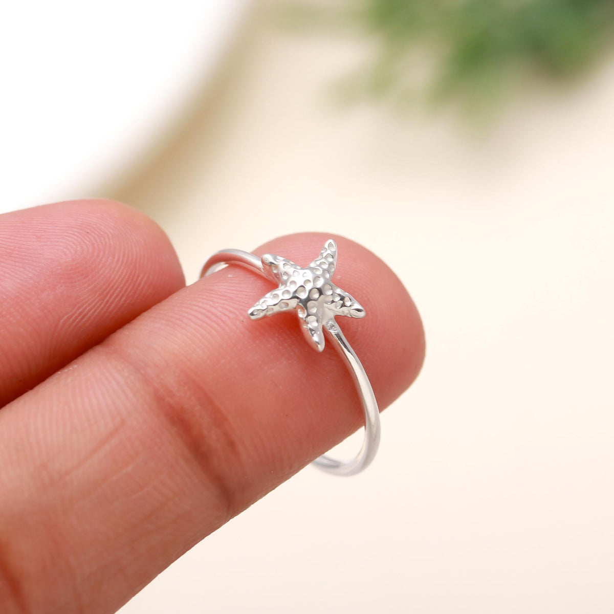The Coastal Charm: Silver Starfish Minimalist Ring