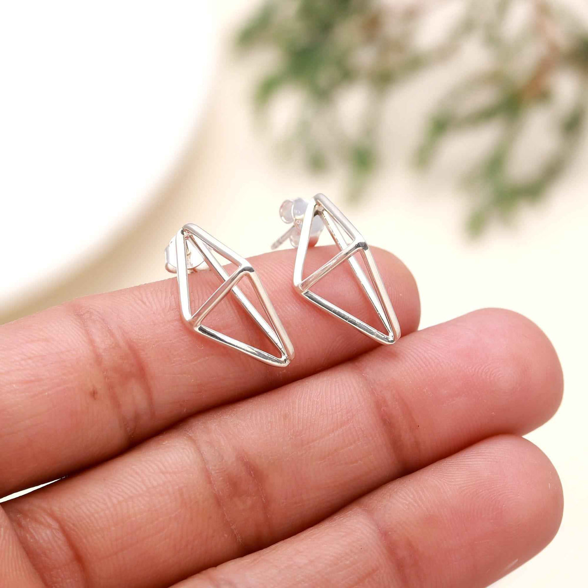 The Silver Apex: Geometric Prism Stud Earrings
