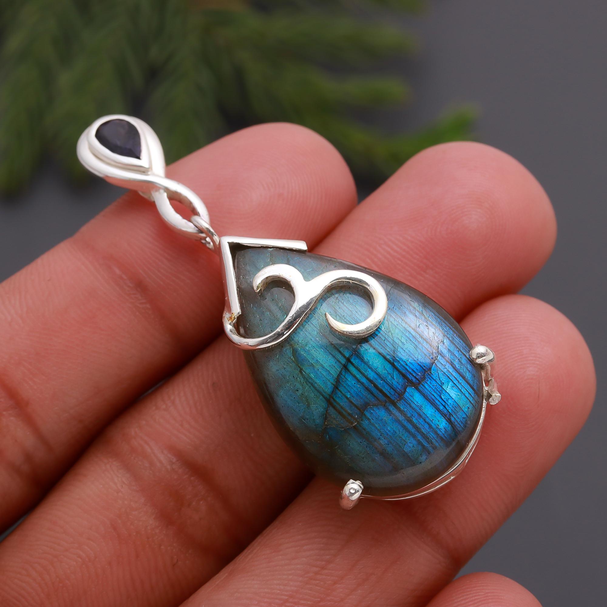 The Mystic Amulet: Labradorite & Silver Teardrop Pendant