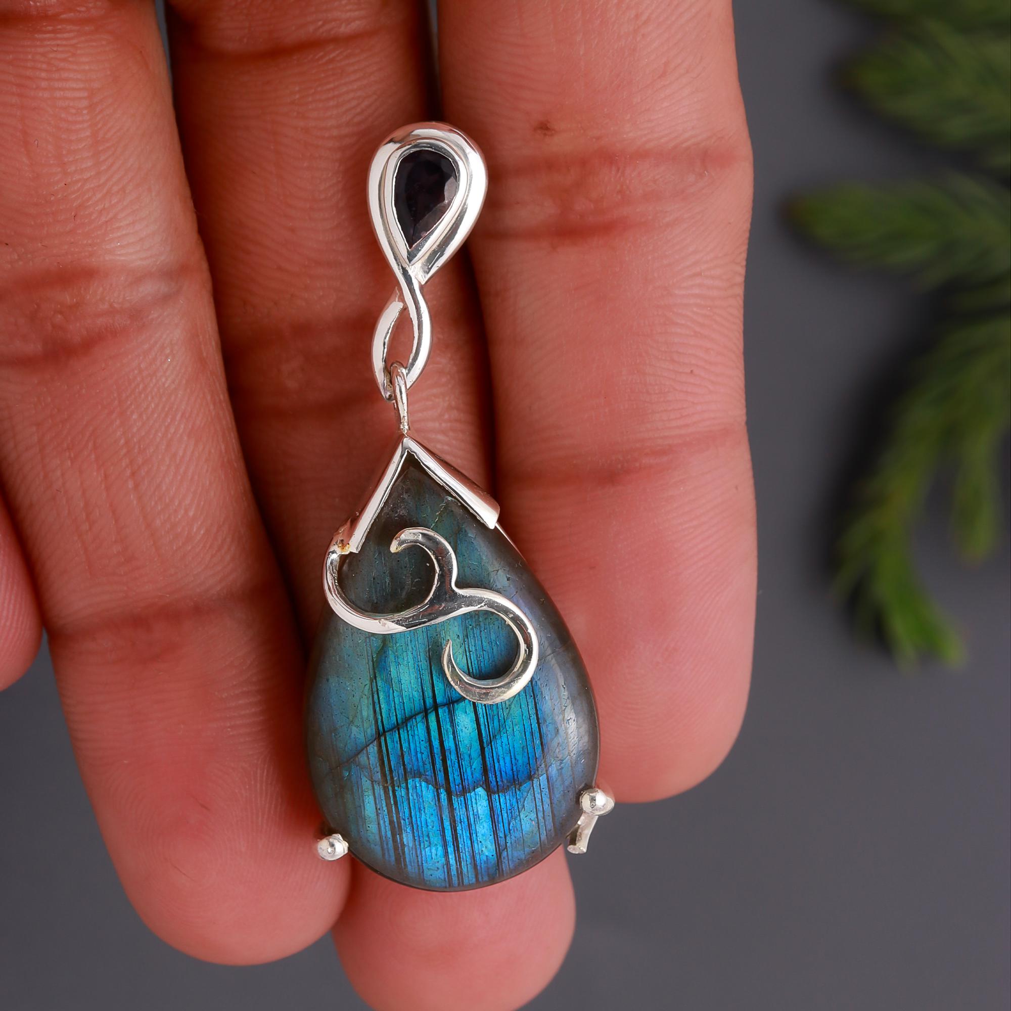The Mystic Amulet: Labradorite & Silver Teardrop Pendant
