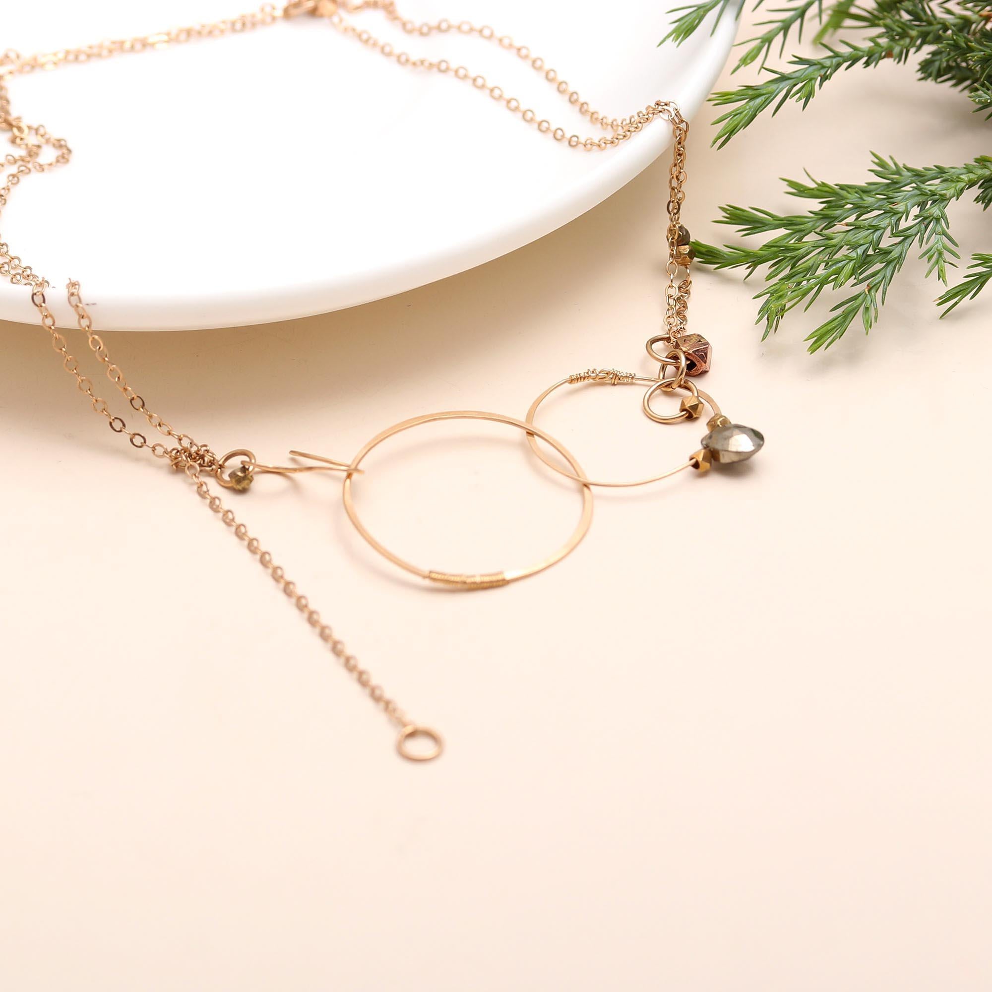 The Orbiting Spheres: Pyrite & Gold Circle Lariat