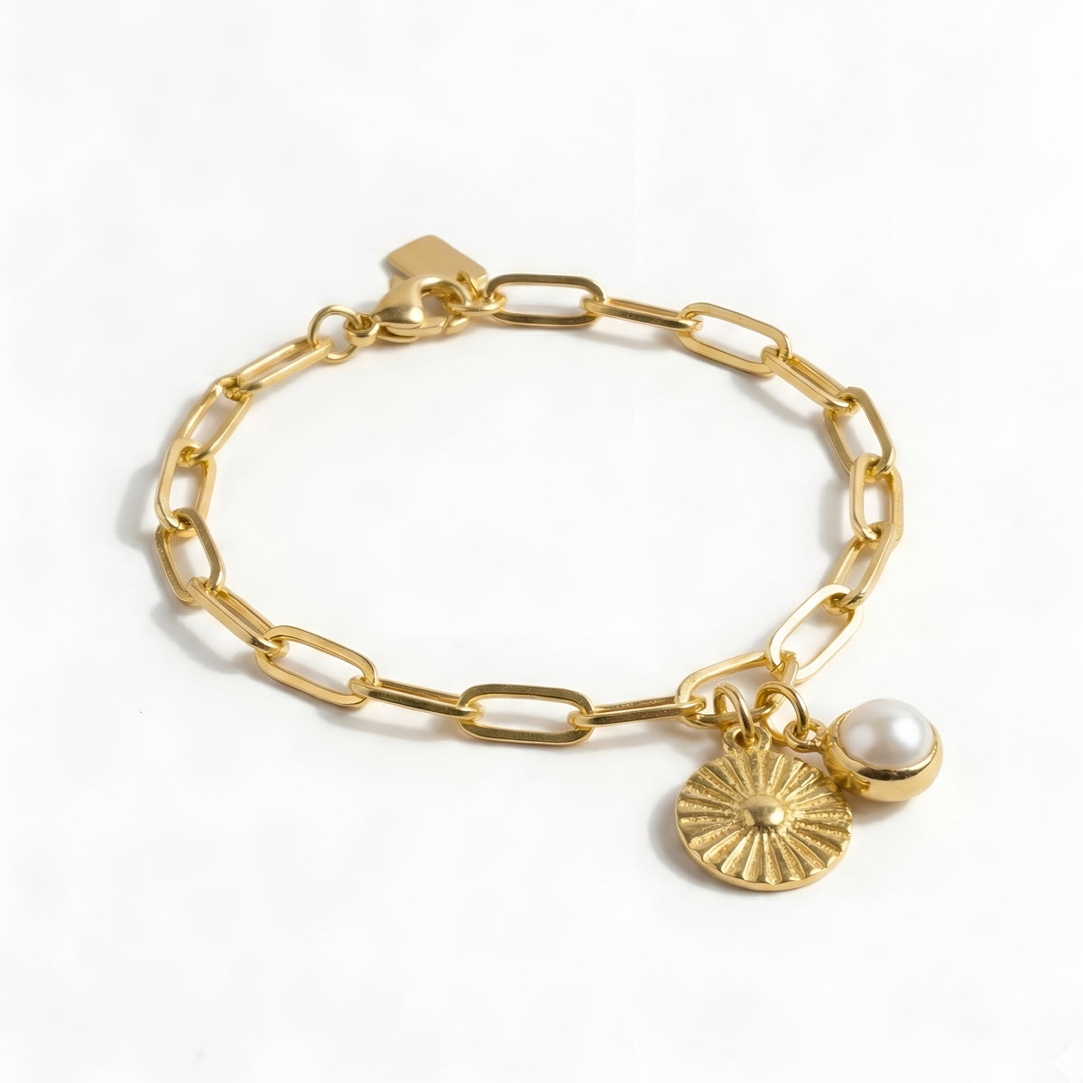 The Soleil Sacré: Sun Medallion & Pearl Charm Bracelet
