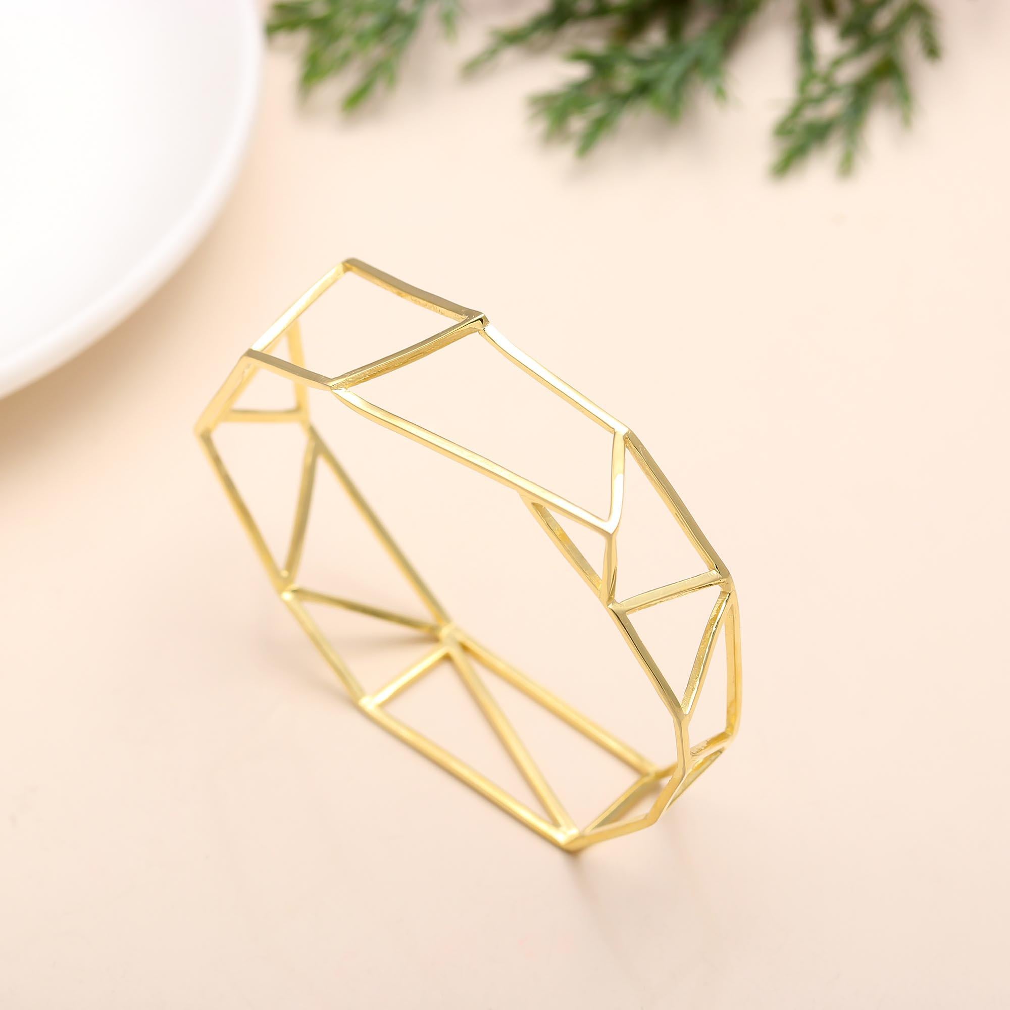 The Faceted Framework: Geometric Gold Bangle