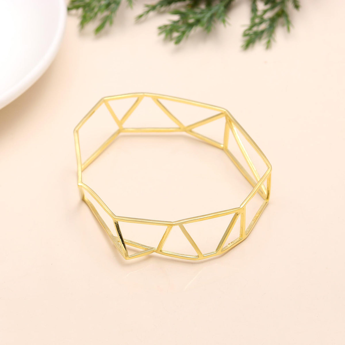 The Faceted Framework: Geometric Gold Bangle