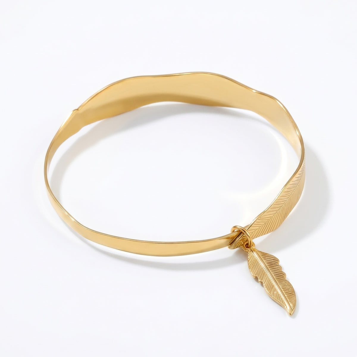 The Golden Plume: Feather Motif Gold Bangle