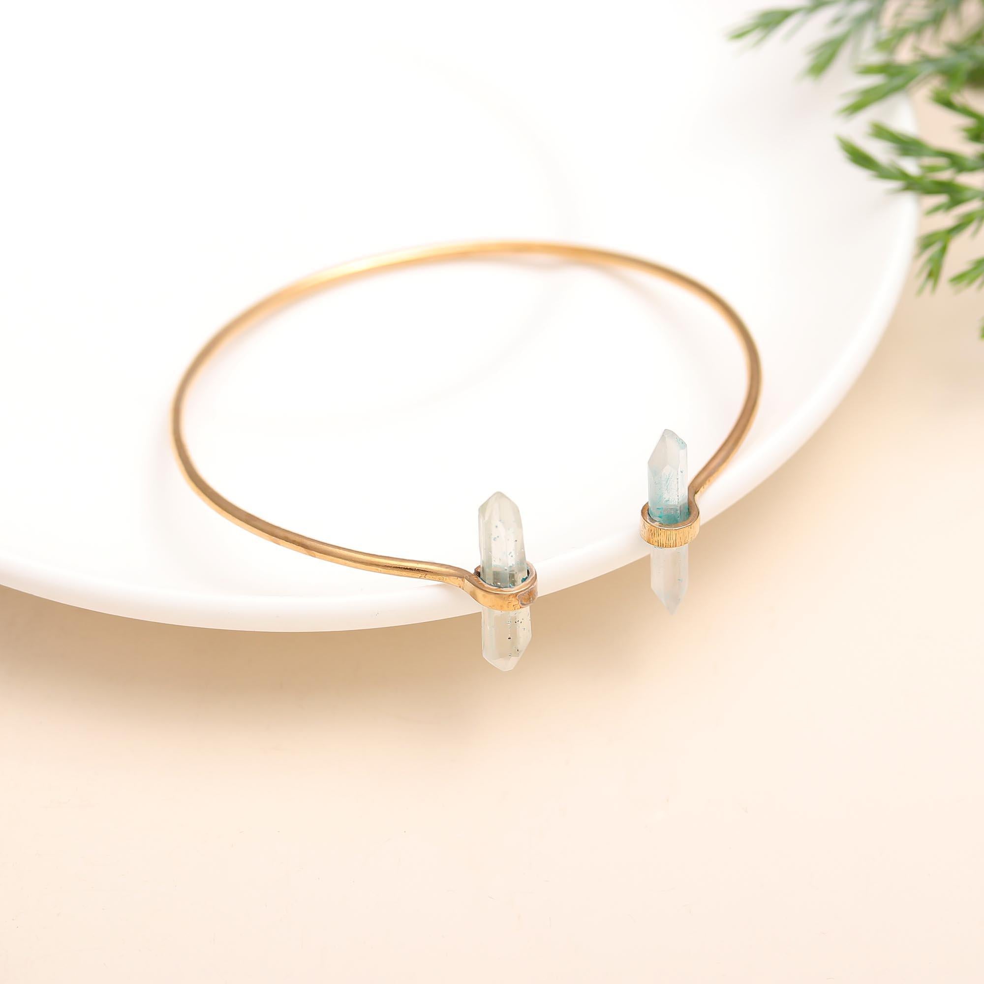 The Crystal Gateway: Gold Quartz Point Cuff