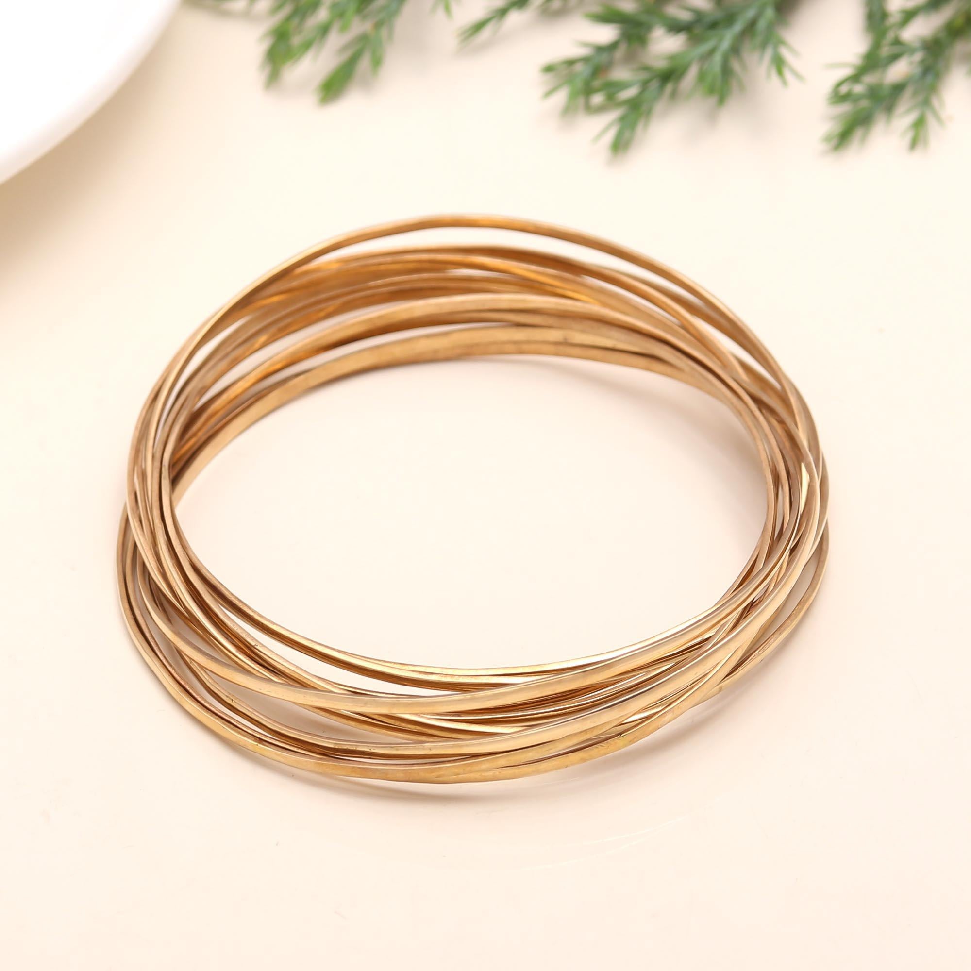 The Golden Cascade: Multi-Strand Gold Bangle Set