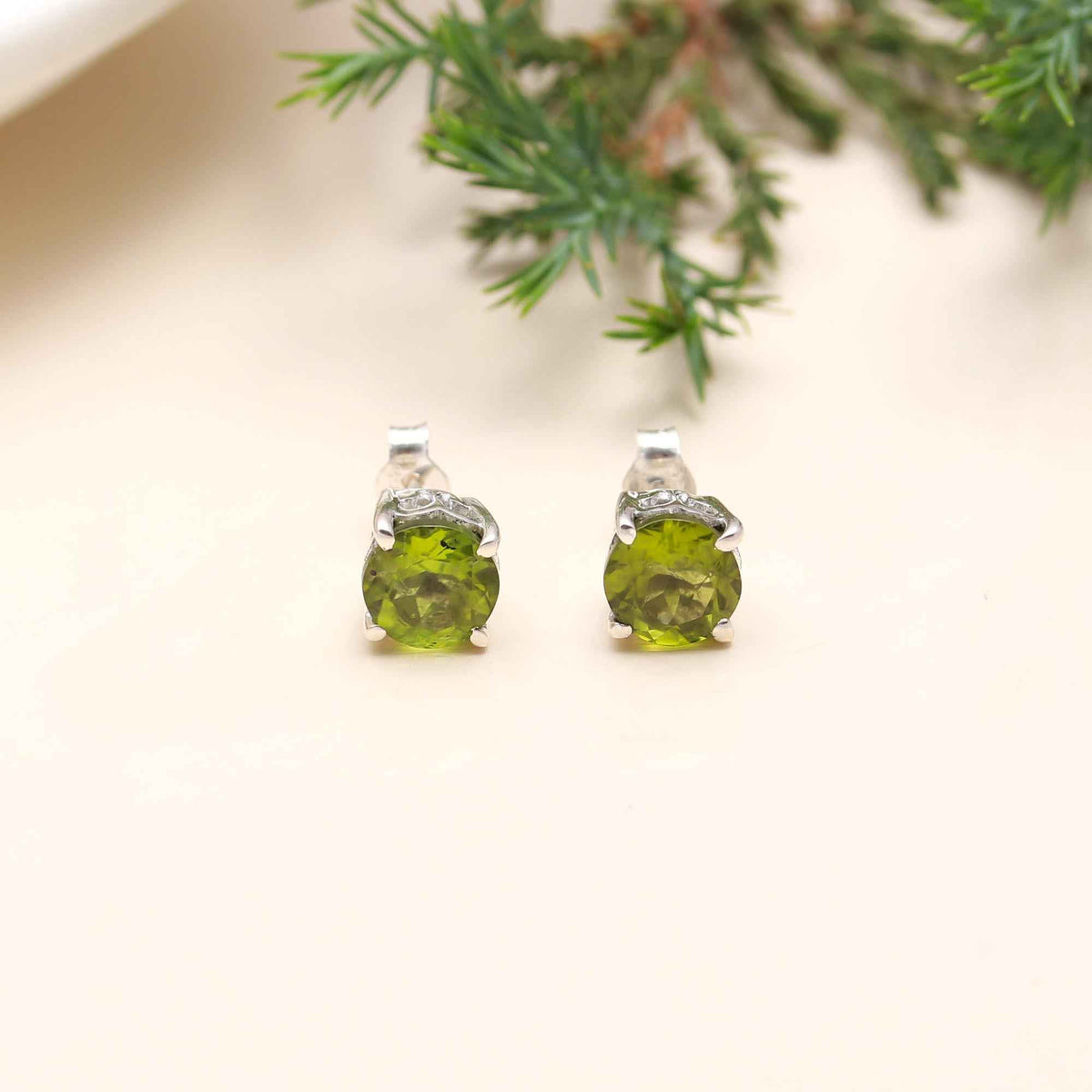 The Verdant Spark: Peridot Solitaire Silver Stud Earrings