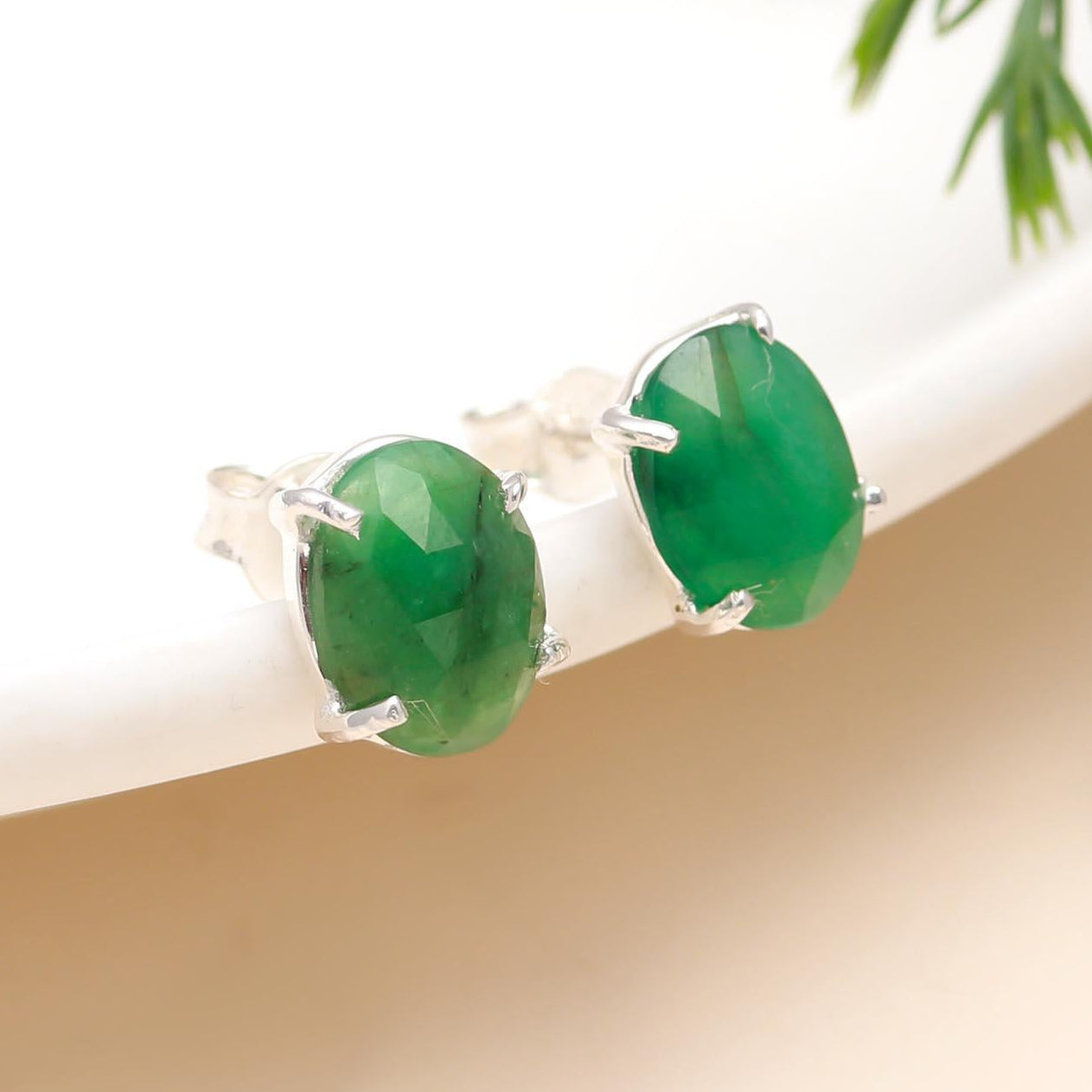 The Verdant Solitaire: Emerald Stud Earrings