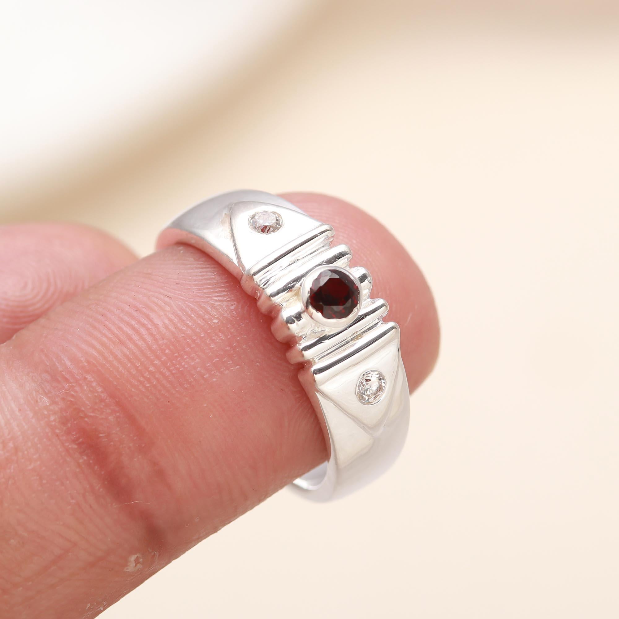 Sterling silver bold band ring with red garnet and CZ