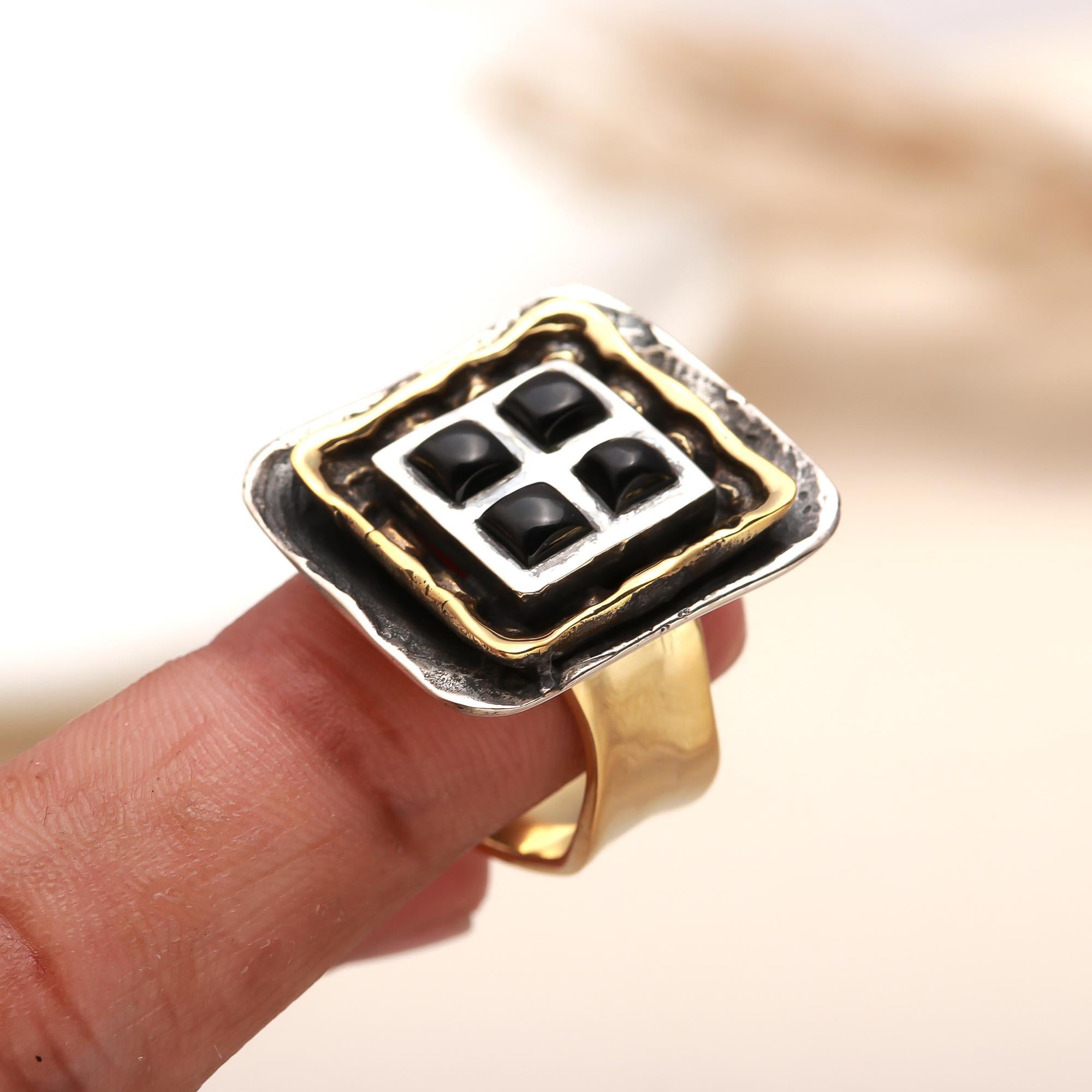 Bold square black onyx ring set in gold-plated silver