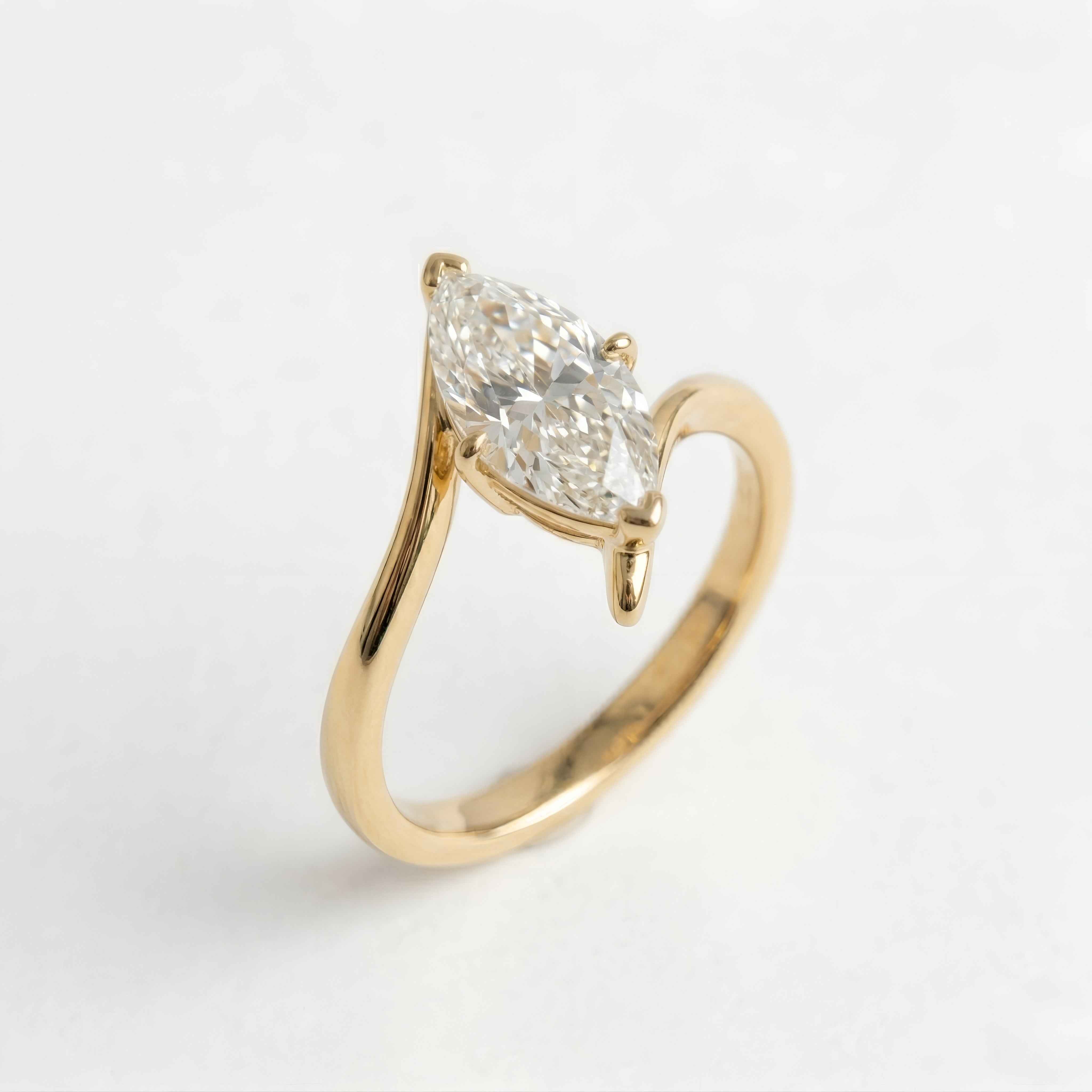 The Marquise Wave: Solitaire Moissanite Bypass Engagement Ring