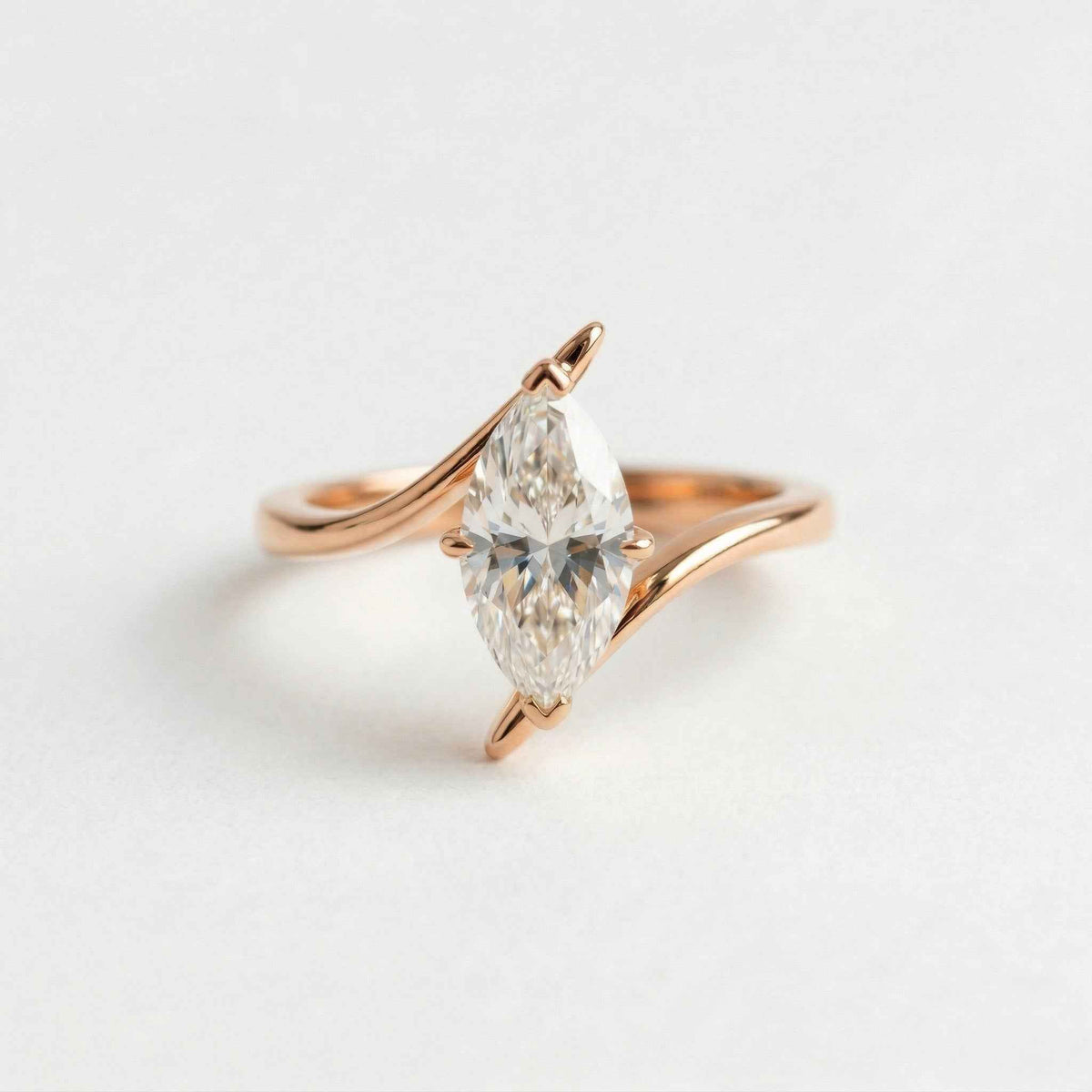 The Marquise Wave: Solitaire Moissanite Bypass Engagement Ring
