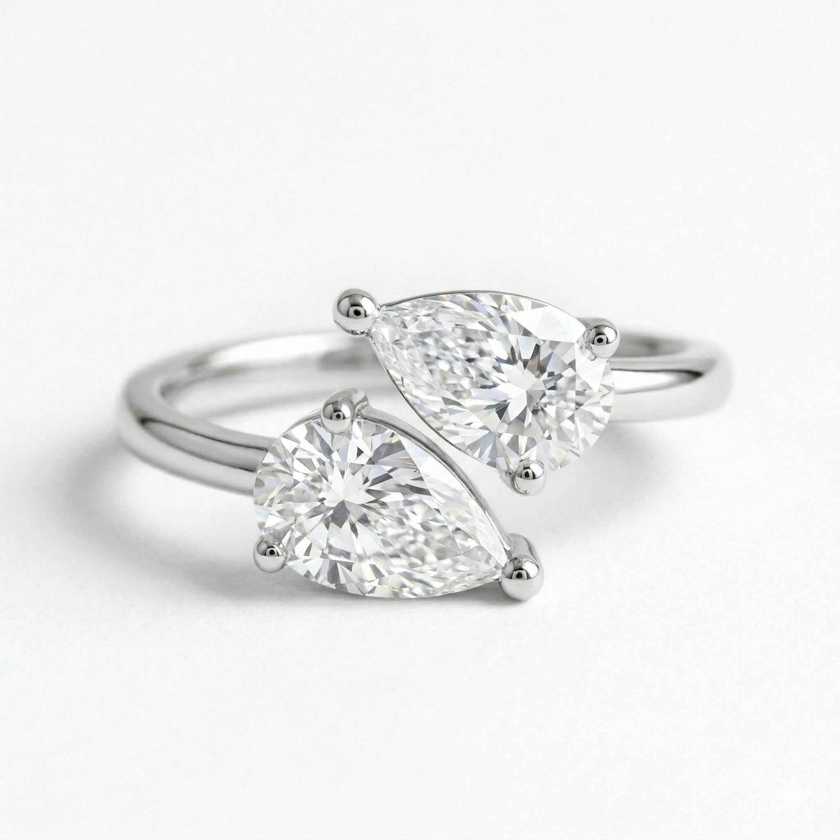 The Toi et Moi: Dual Pear Moissanite Gold Bypass Ring