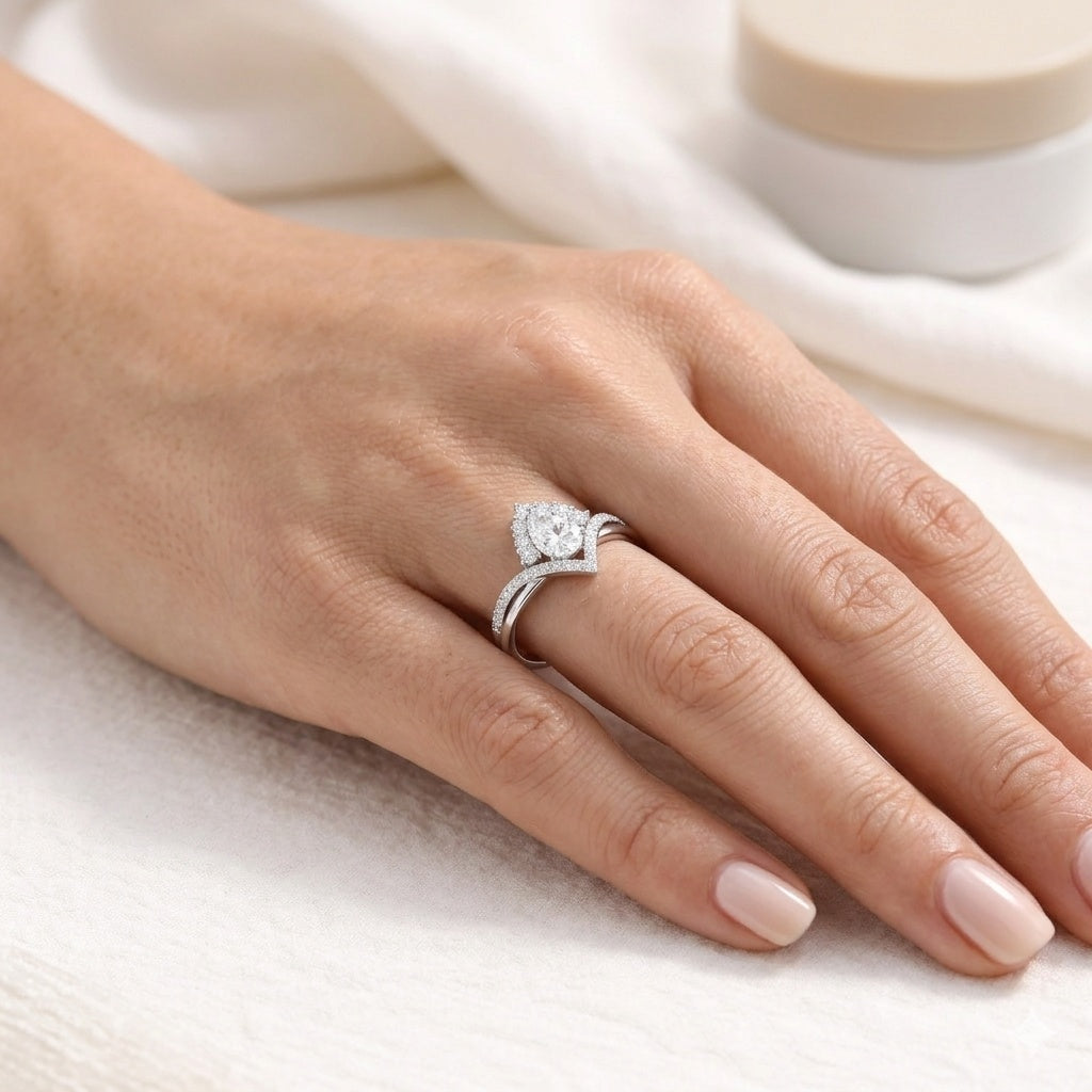 The Regal Teardrop: 1.56ct Pear Moissanite Crown Engagement Ring