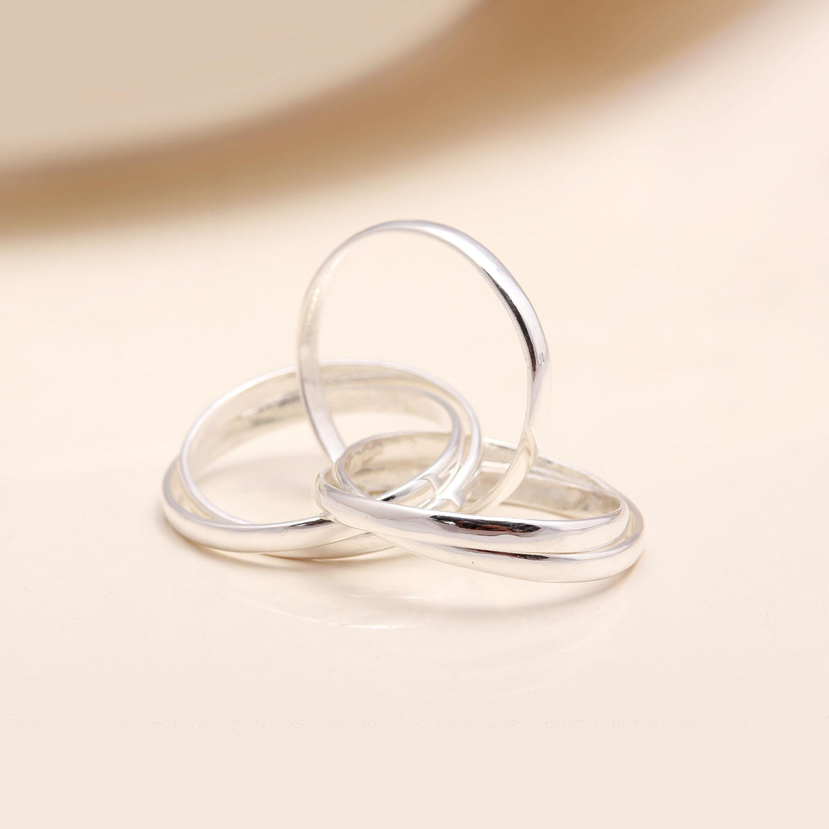 The Interlocking Trinity: Rolling Russian Wedding Ring