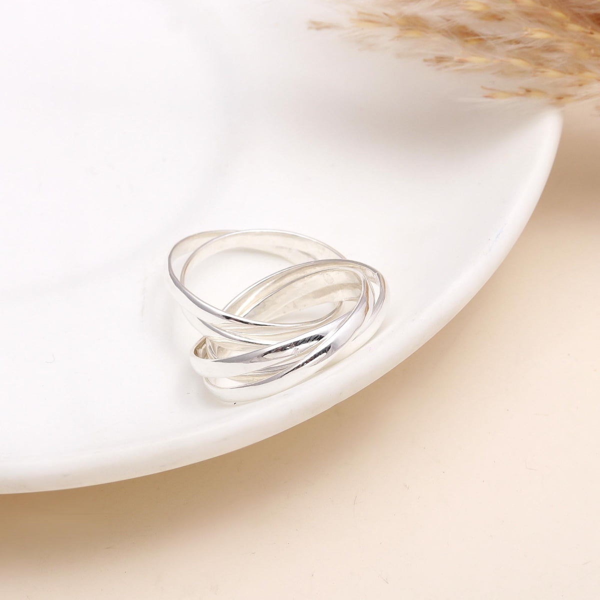 The Interlocking Trinity: Rolling Russian Wedding Ring