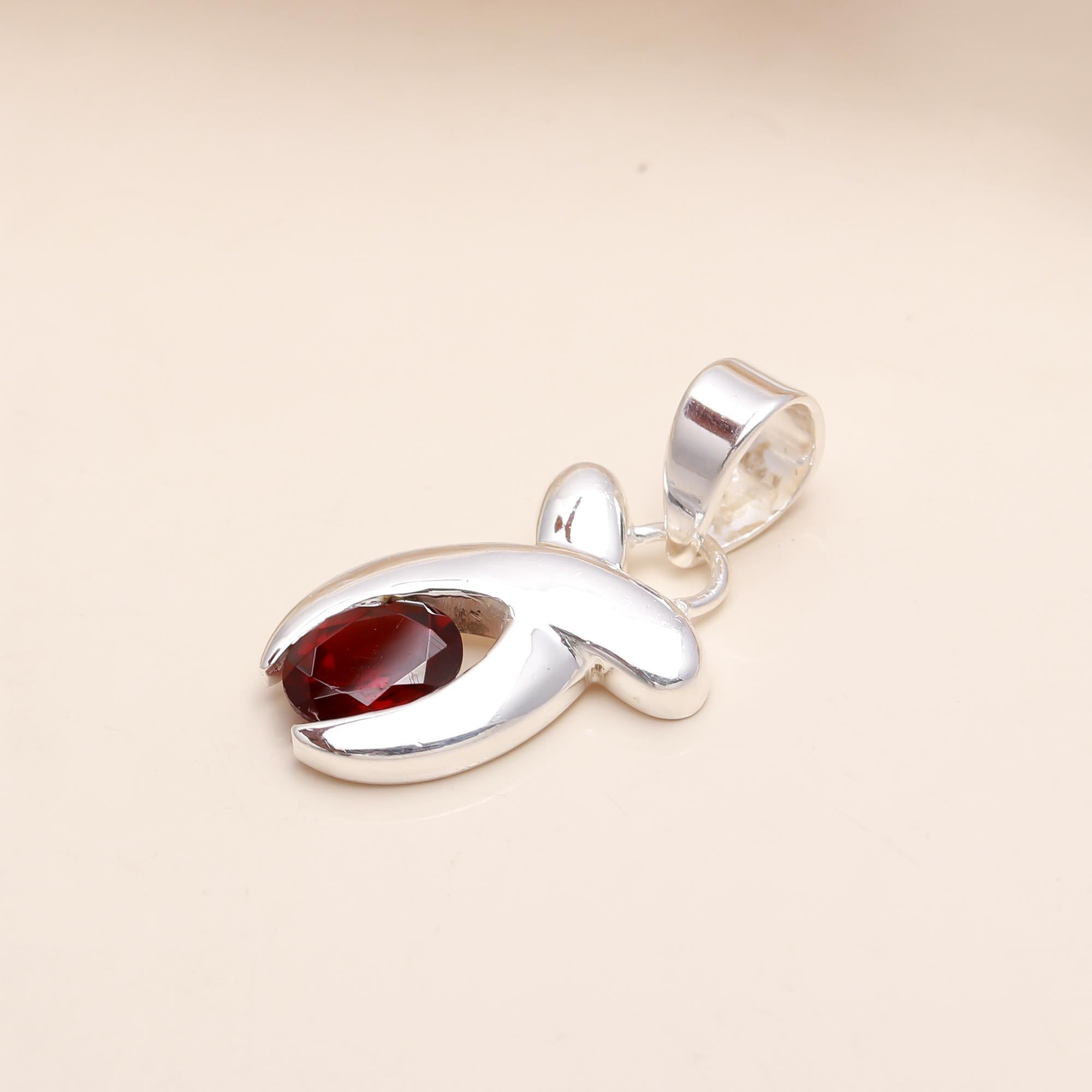 The Crimson Curve: Modern Abstract Red Garnet Sculptural Pendant