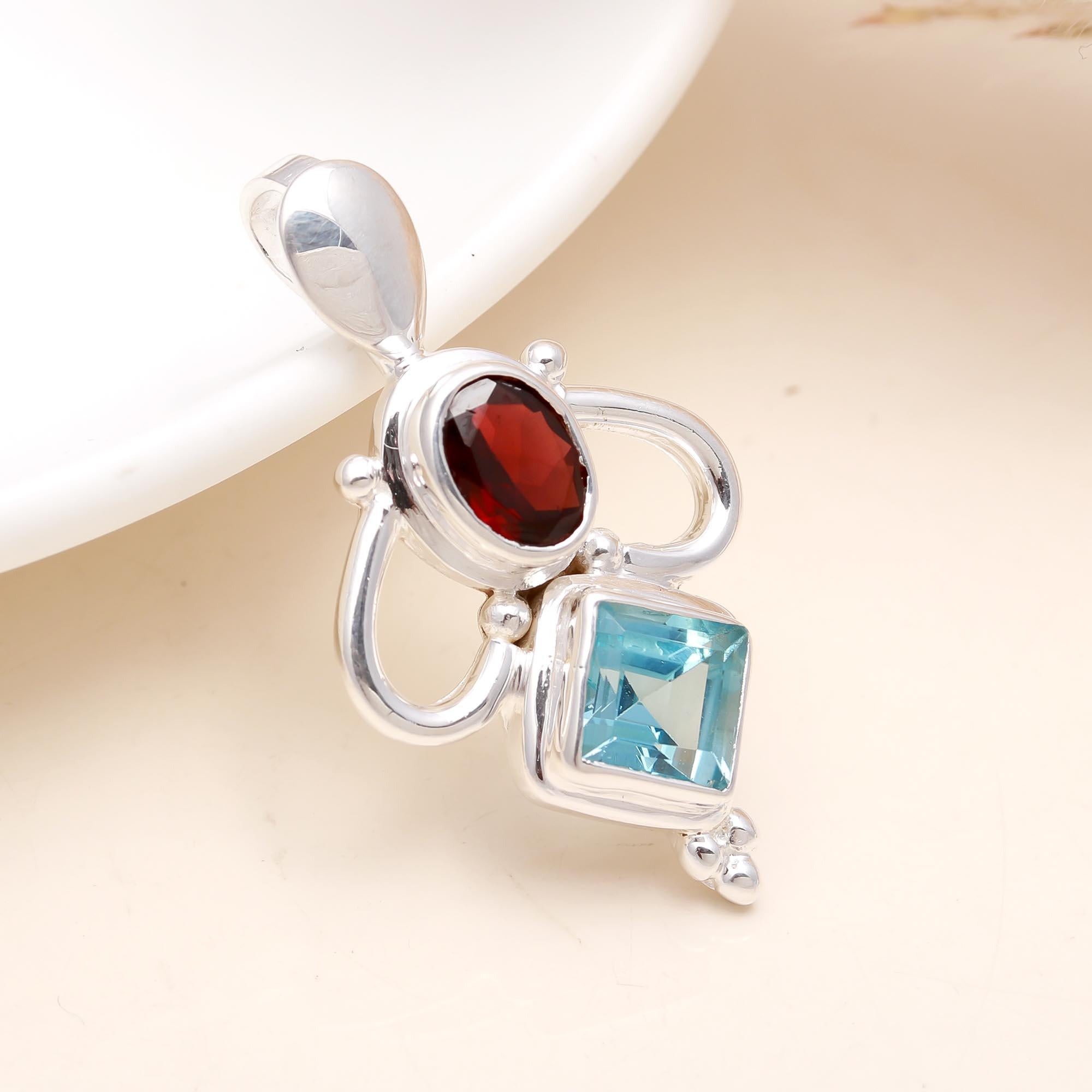 The Fire & Ice: Garnet & Blue Topaz Geometric Pendant