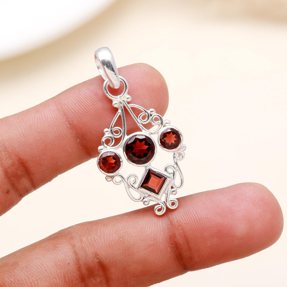 The Crimson Court: Multi-Cut Garnet Filigree Silver Pendant