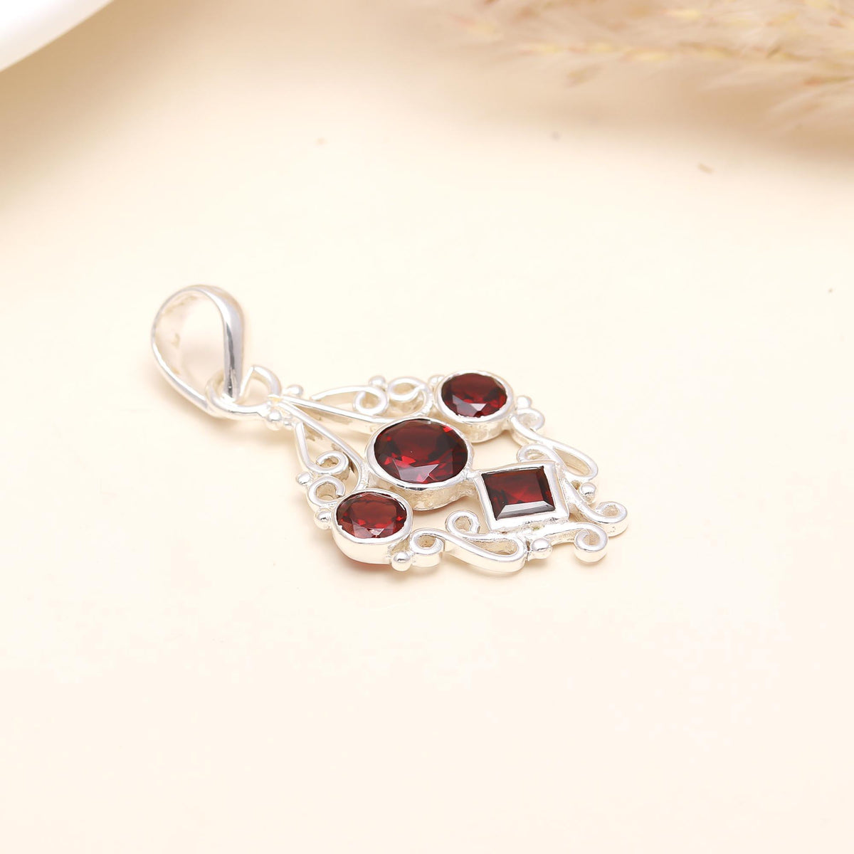 The Crimson Court: Multi-Cut Garnet Filigree Silver Pendant
