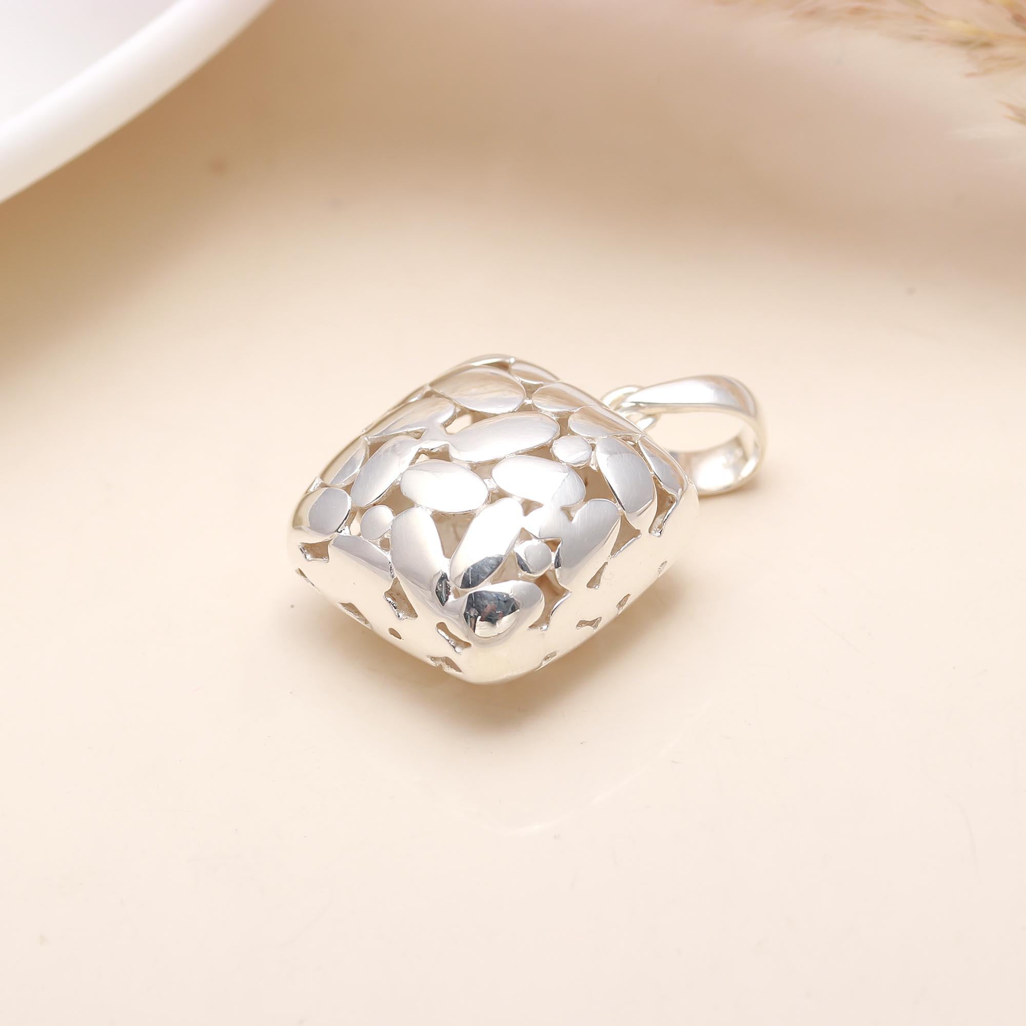 The Silver Mosaic: Abstract Cutout Pillow Pendant