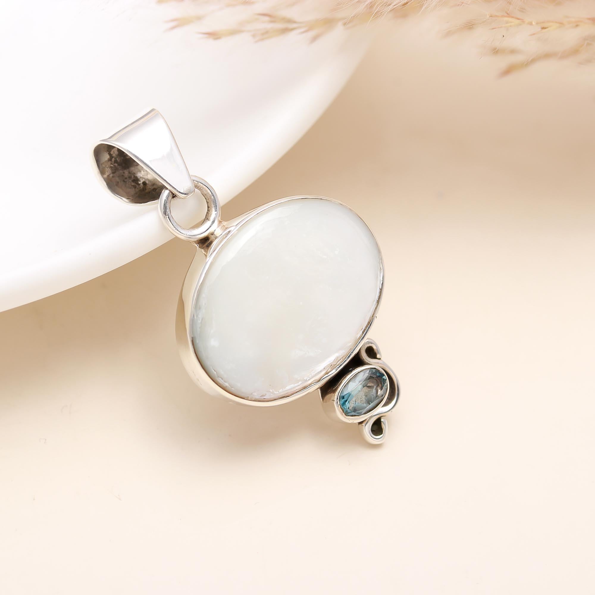 The Coastal Classic: Sterling Silver Pearl & Blue Topaz Pendant