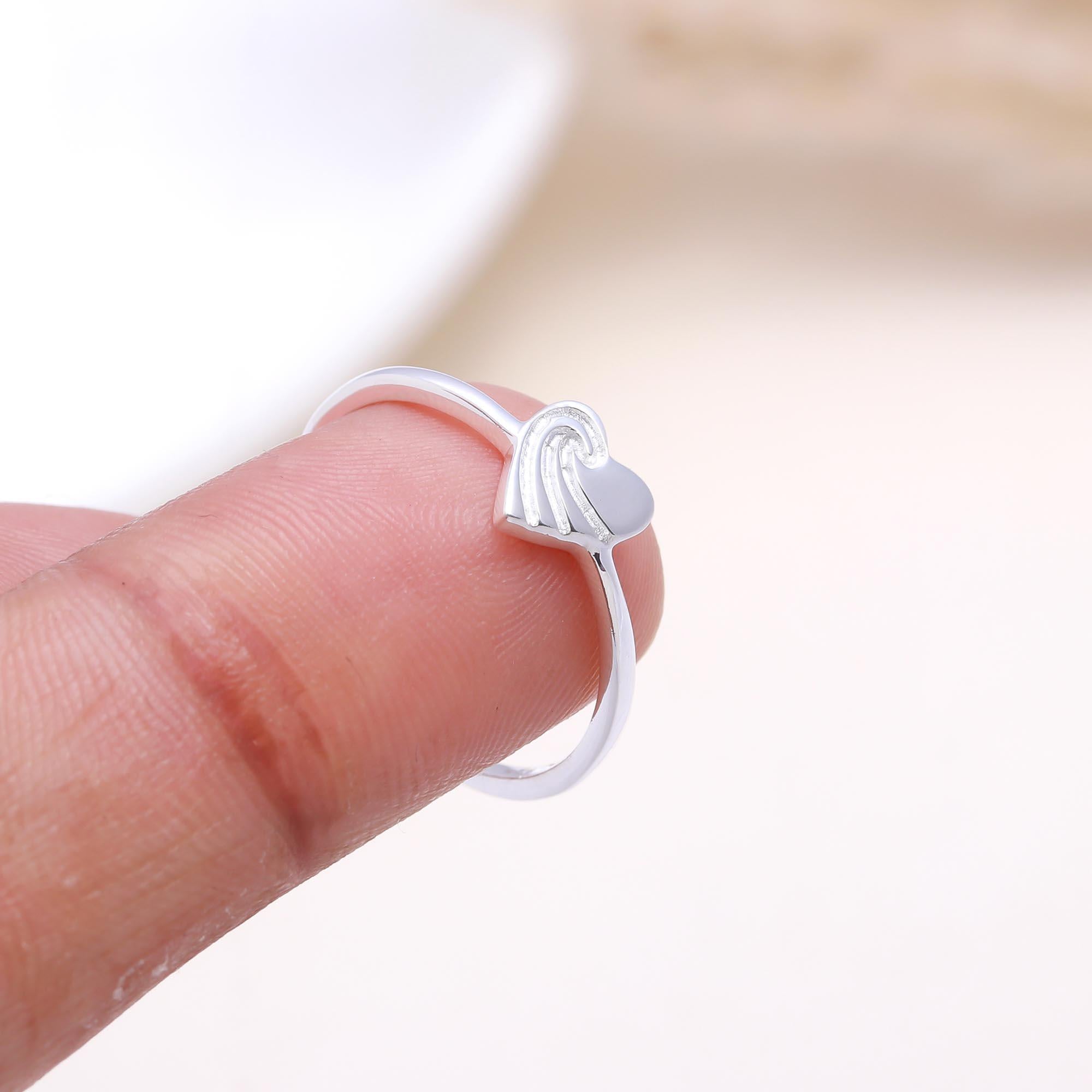 The Heart of the Sea: Wave Engraved Heart Ring