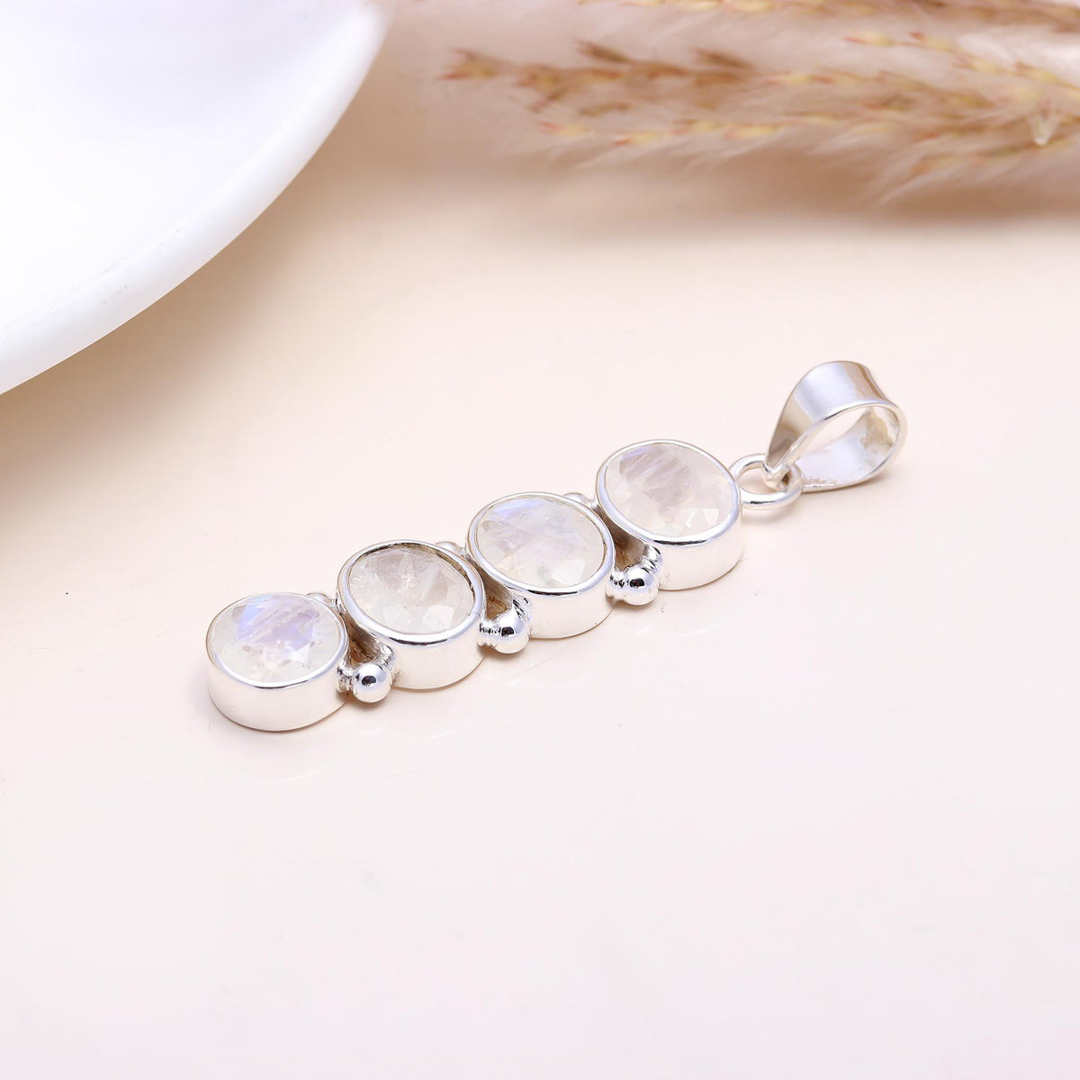The Moonstone Cascade: Linear Rainbow Moonstone Pendant