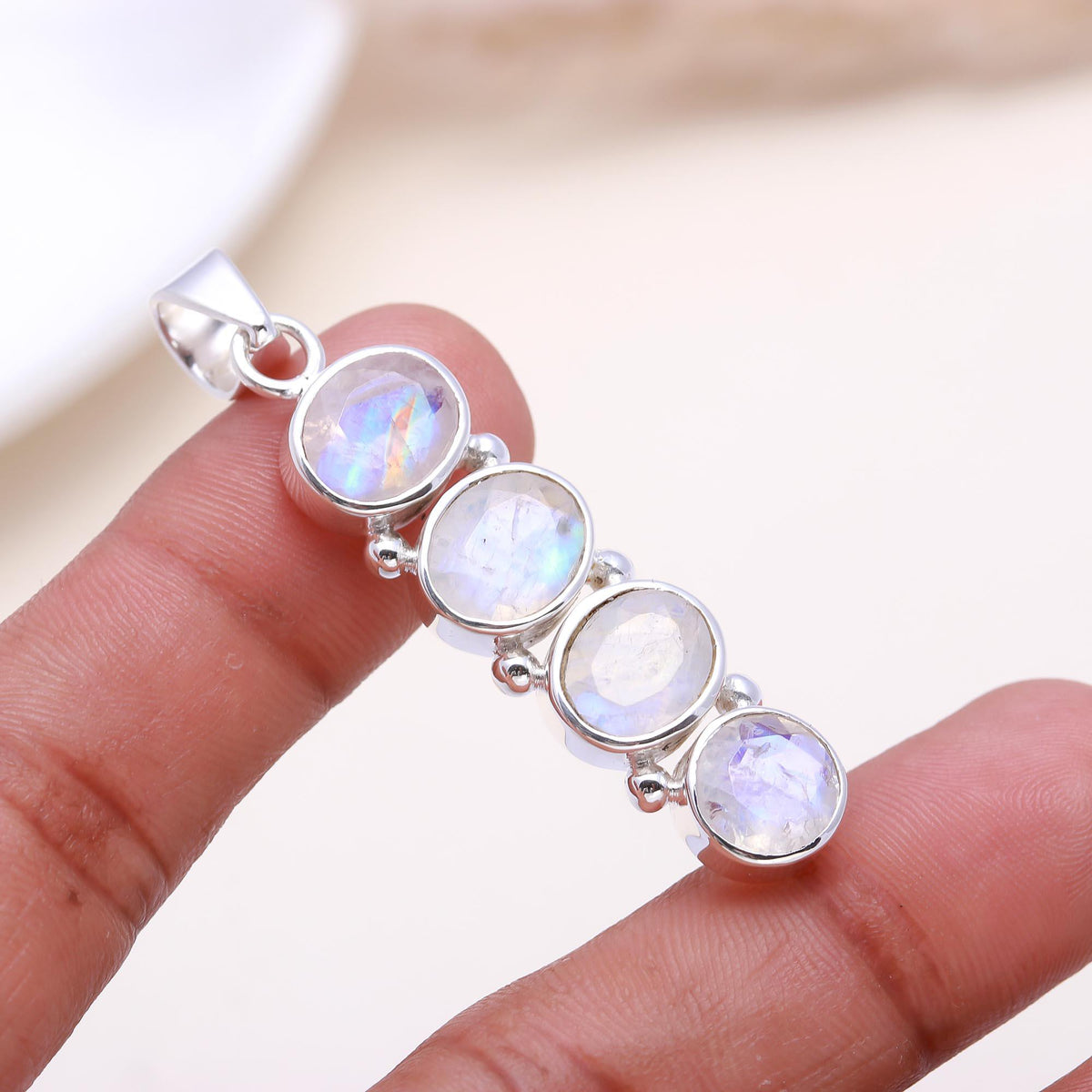 The Moonstone Cascade: Linear Rainbow Moonstone Pendant