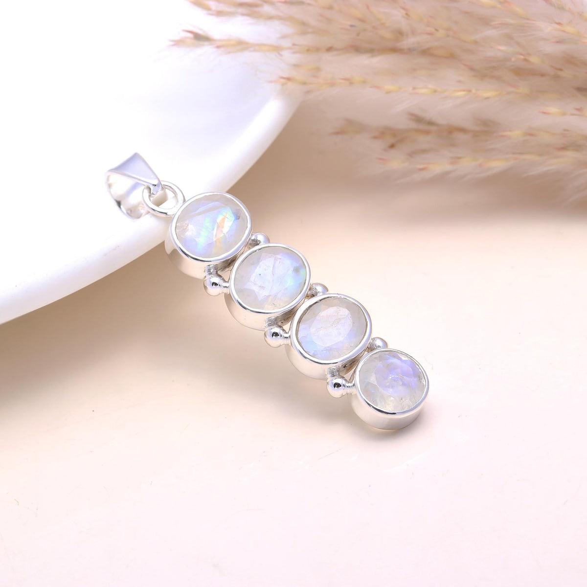 The Moonstone Cascade: Linear Rainbow Moonstone Pendant