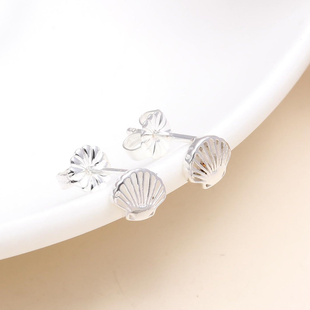 Decorative ceiling light fixture with crystal-like design on a neutral background