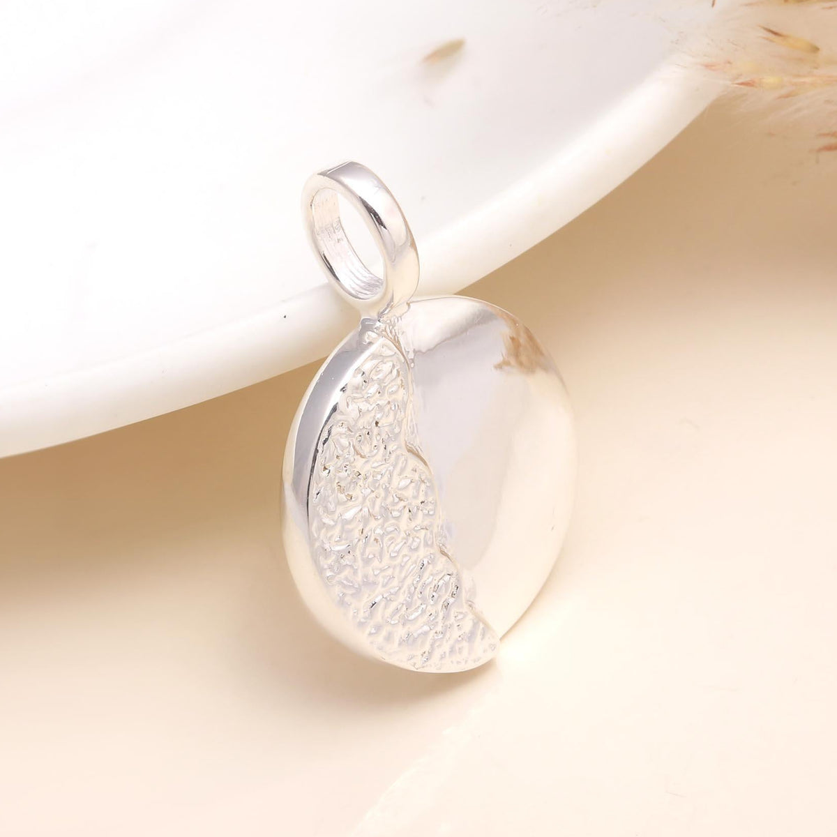 A 925 Sterling Silver Modern Textured Disc Pendant displayed against a neutral background.