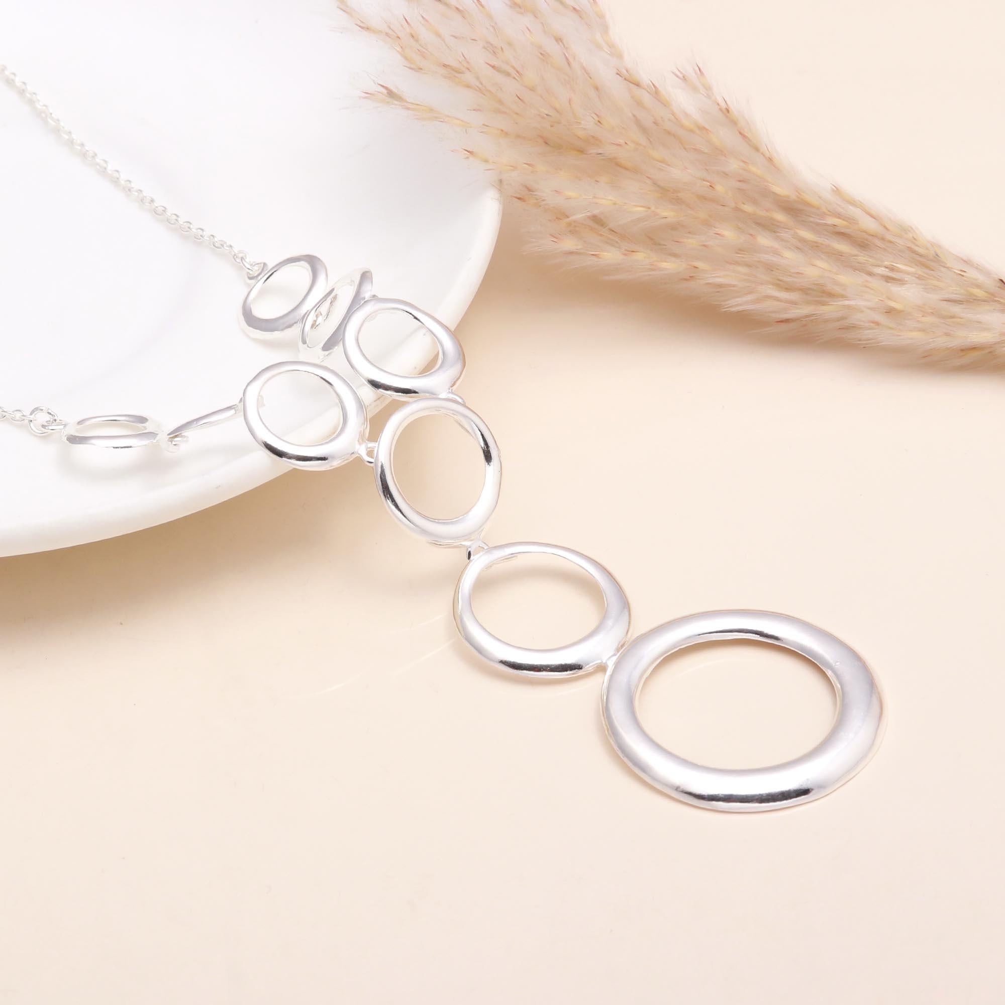 The Silver Cascade: Open Circle Lariat Necklace