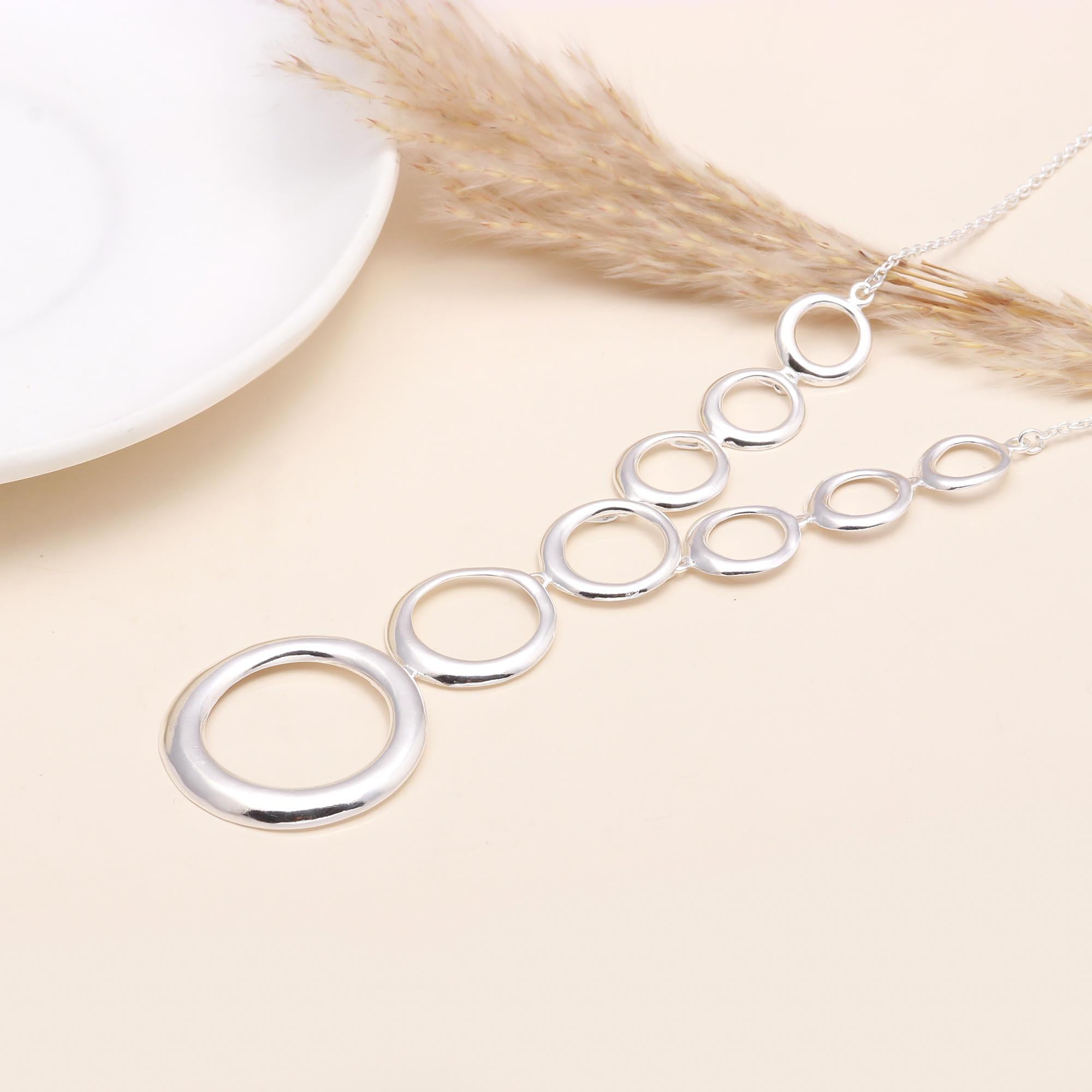 The Silver Cascade: Open Circle Lariat Necklace