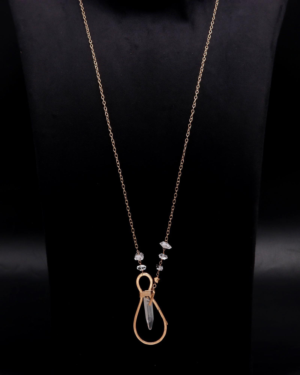 The Crystal Loop: Gold Wire Wrapped Raw Quartz Pendant