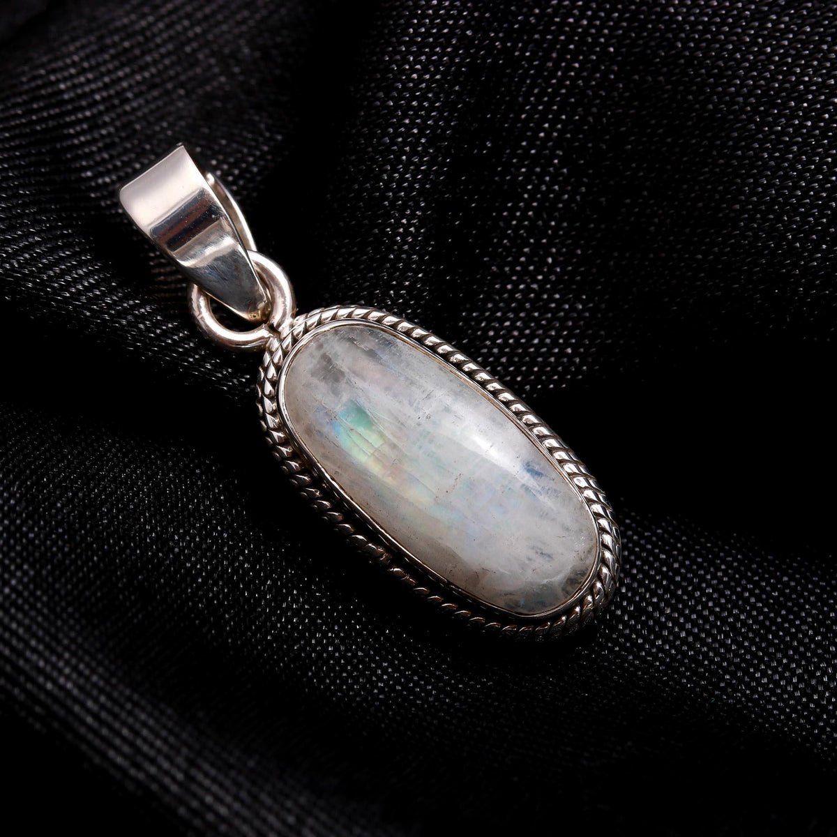 The Moonstone Horizon: Twisted Rope Silver Pendant