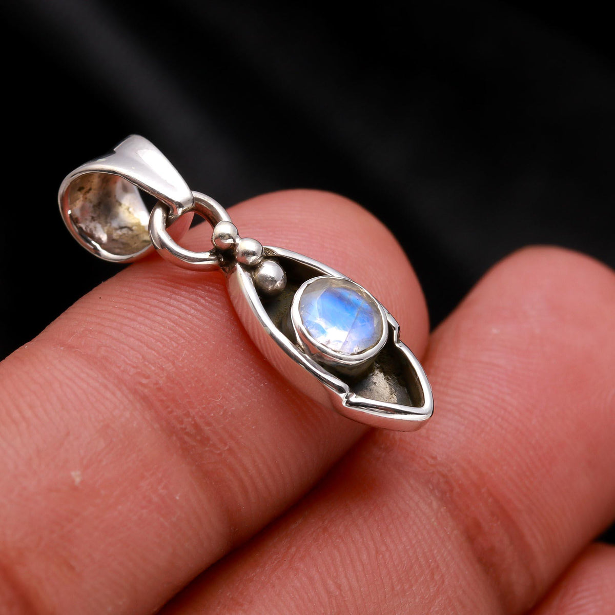 The Moonstone Arc: Minimalist Silver Charm