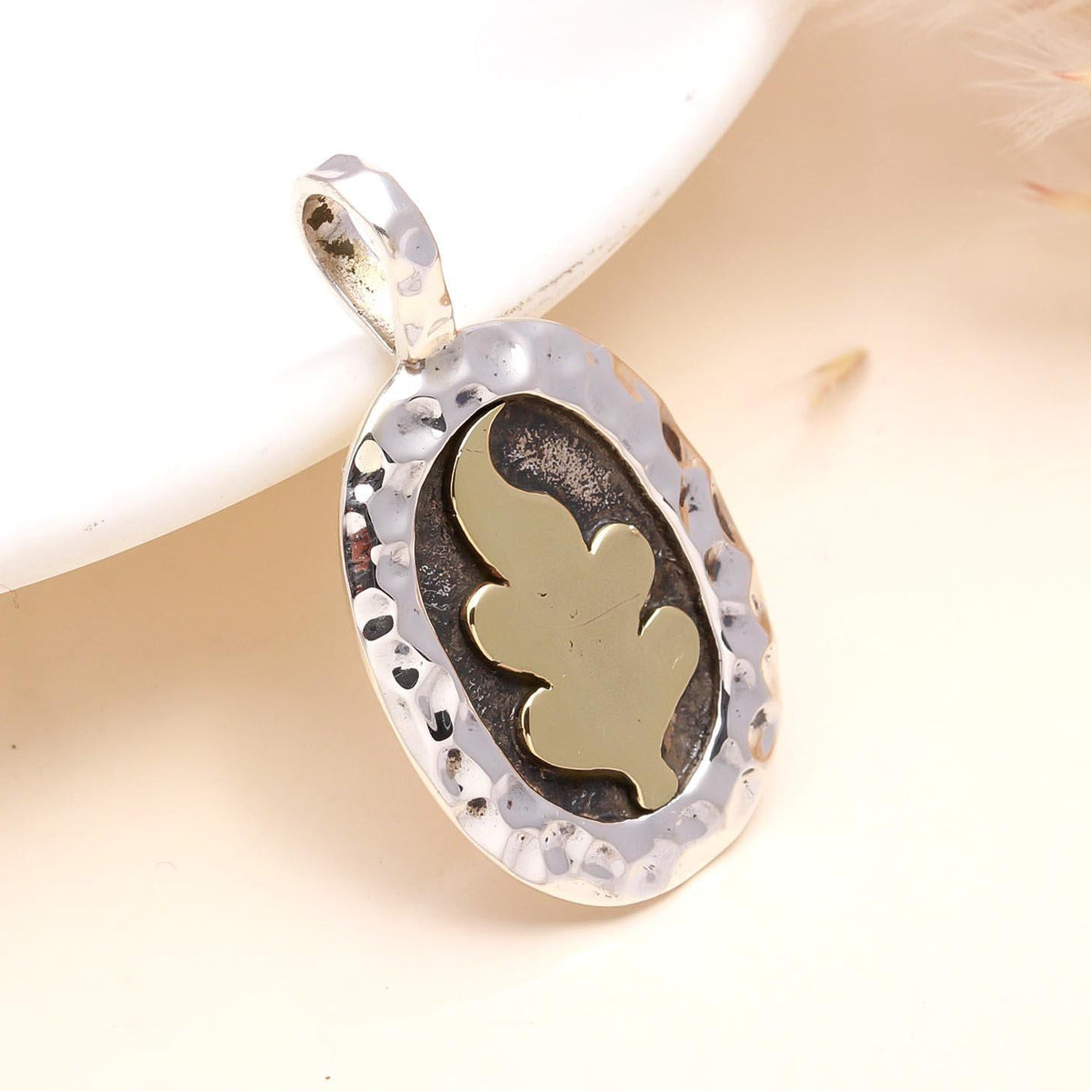A 925 Sterling Silver Oak Leaf Pendant with intricate detailing, displayed against a neutral background.