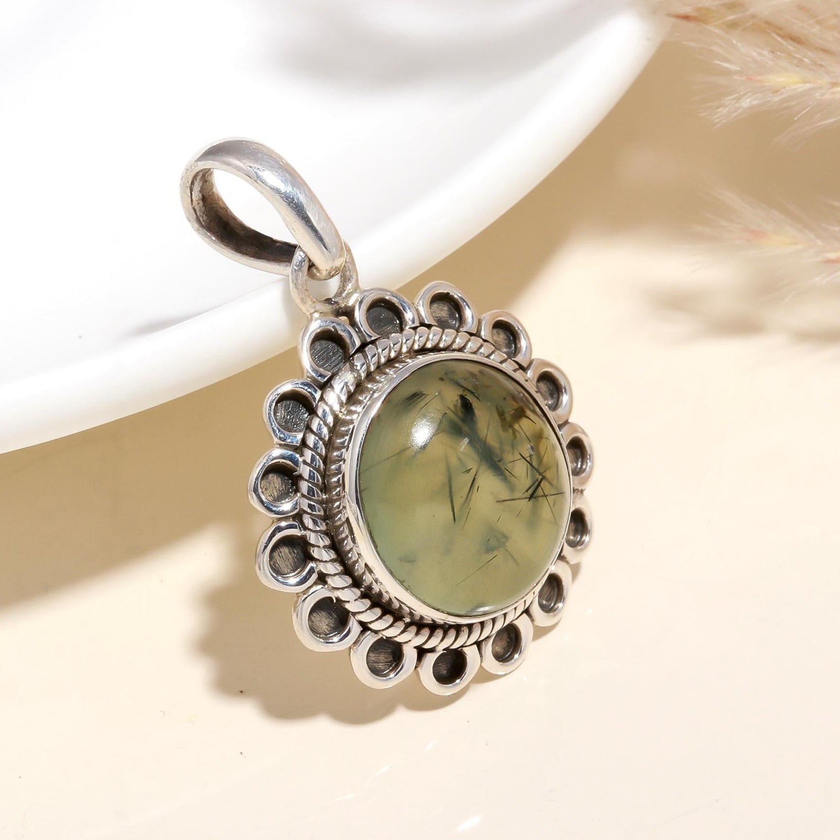 A 925 Sterling Silver pendant with a round prehnite gemstone, featuring vintage-style filigree silverwork.