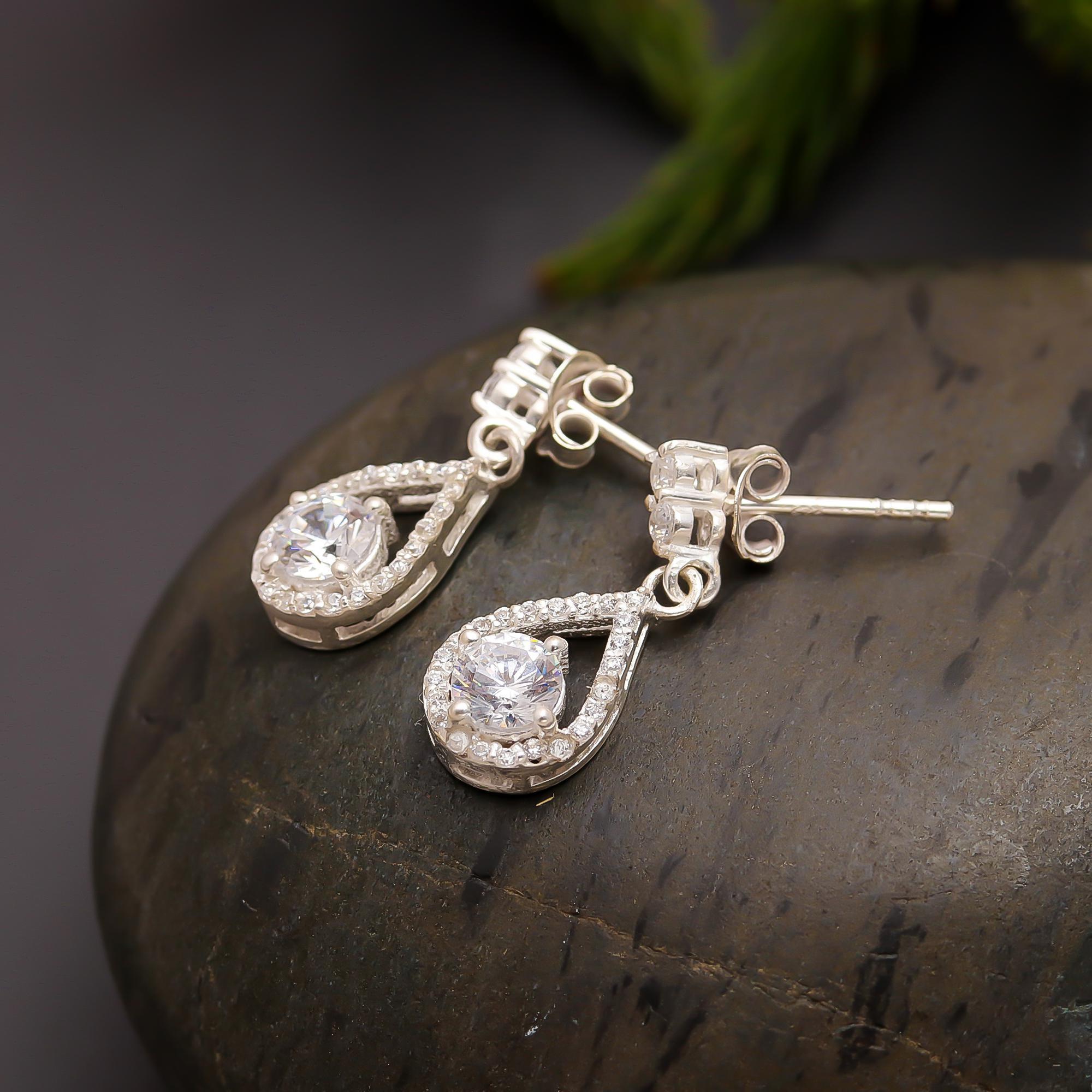 The Crystal Cascade: Cubic Zirconia & Silver Halo stud Earrings