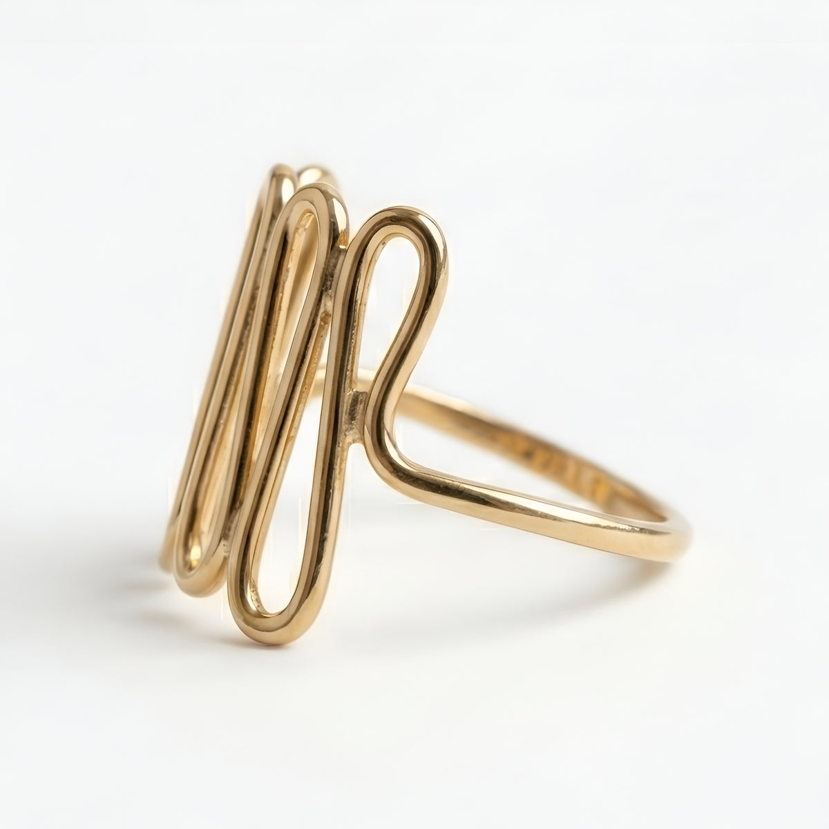 The Slinky Arc: Multi-Loop Open Wire Ring
