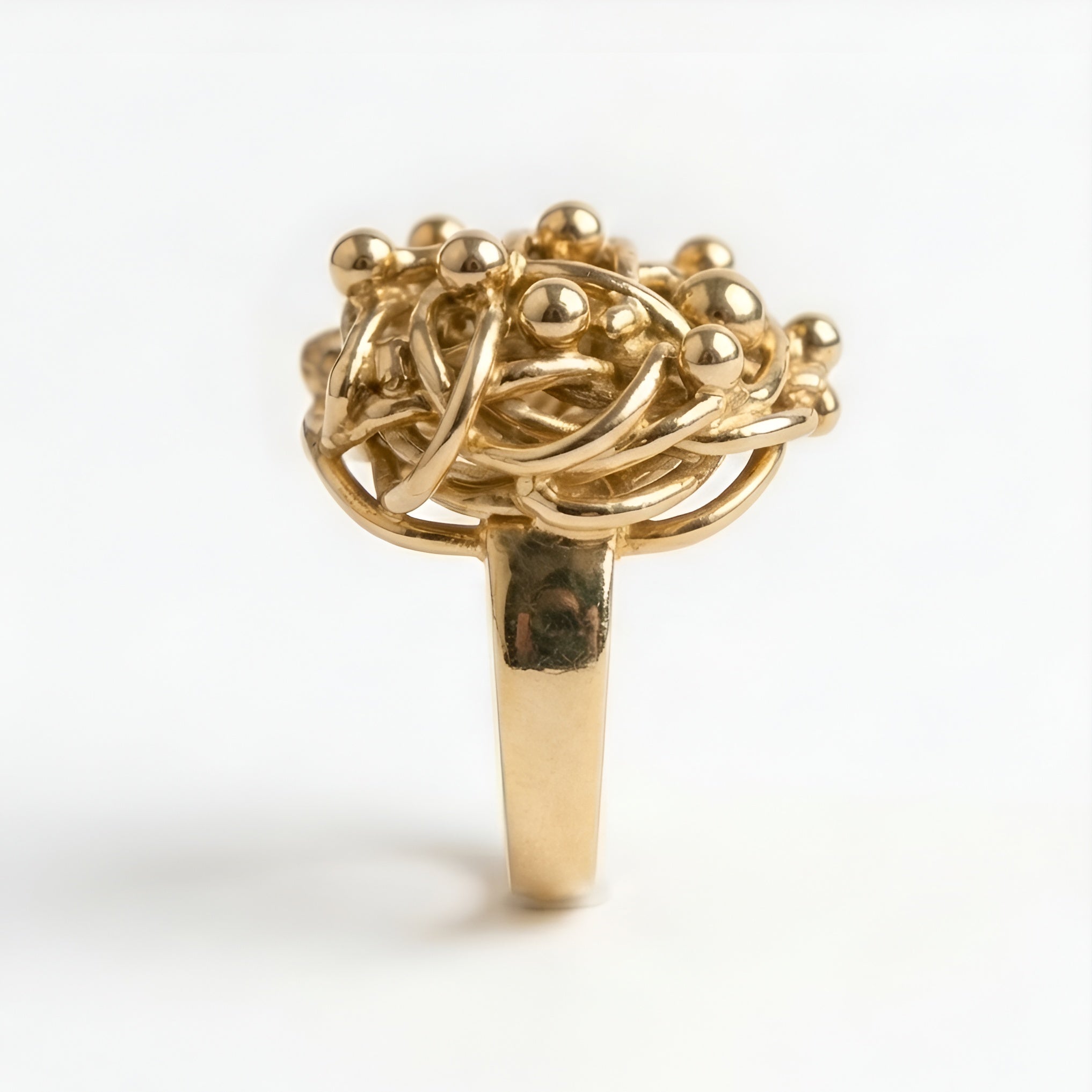 The Gordian Knot: Twisted Wire Ball-Tip Cluster Ring